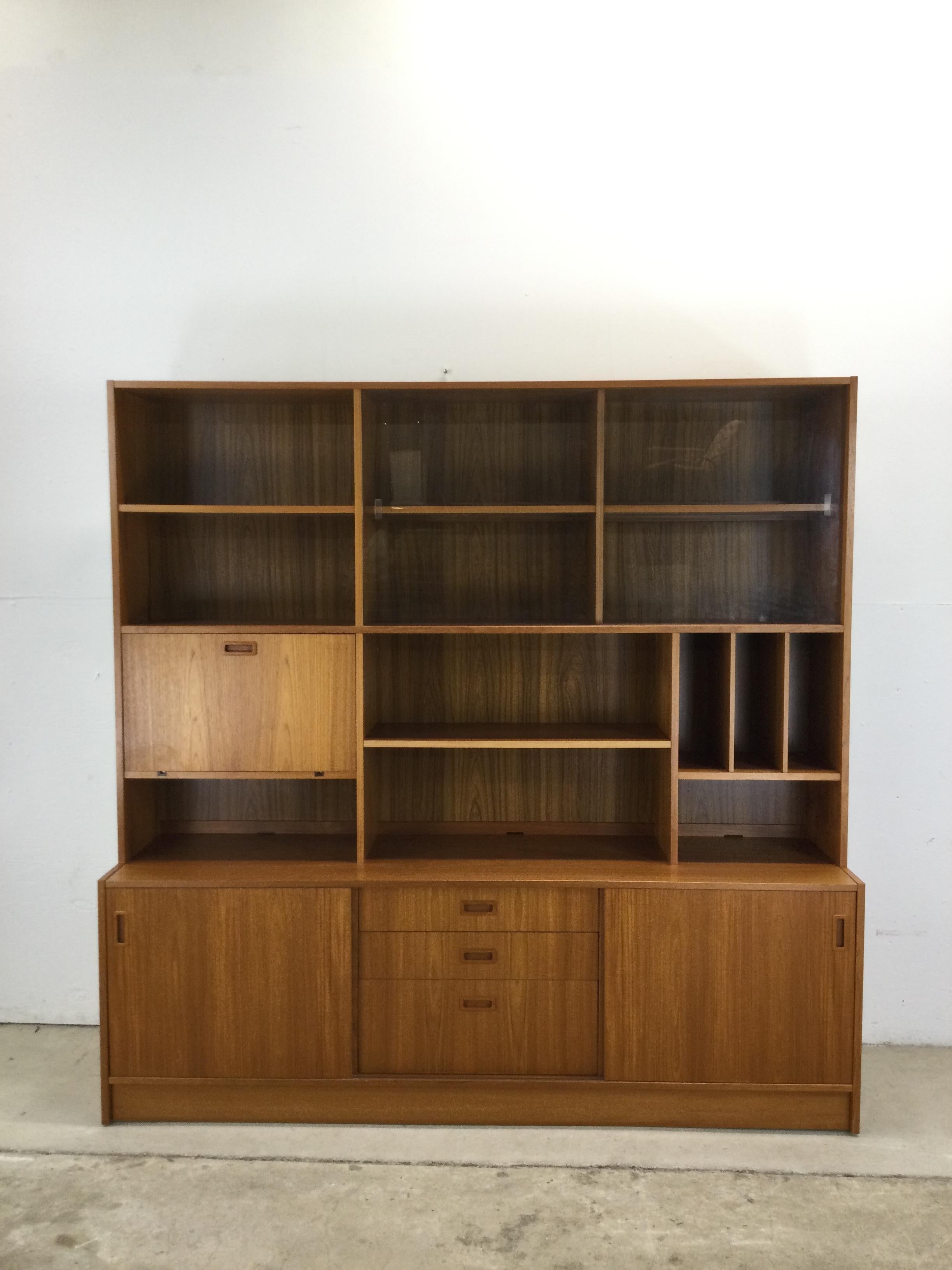 Scandinavian Modern Danish modern shelving unit with sliding glass doors and drop front cabinet