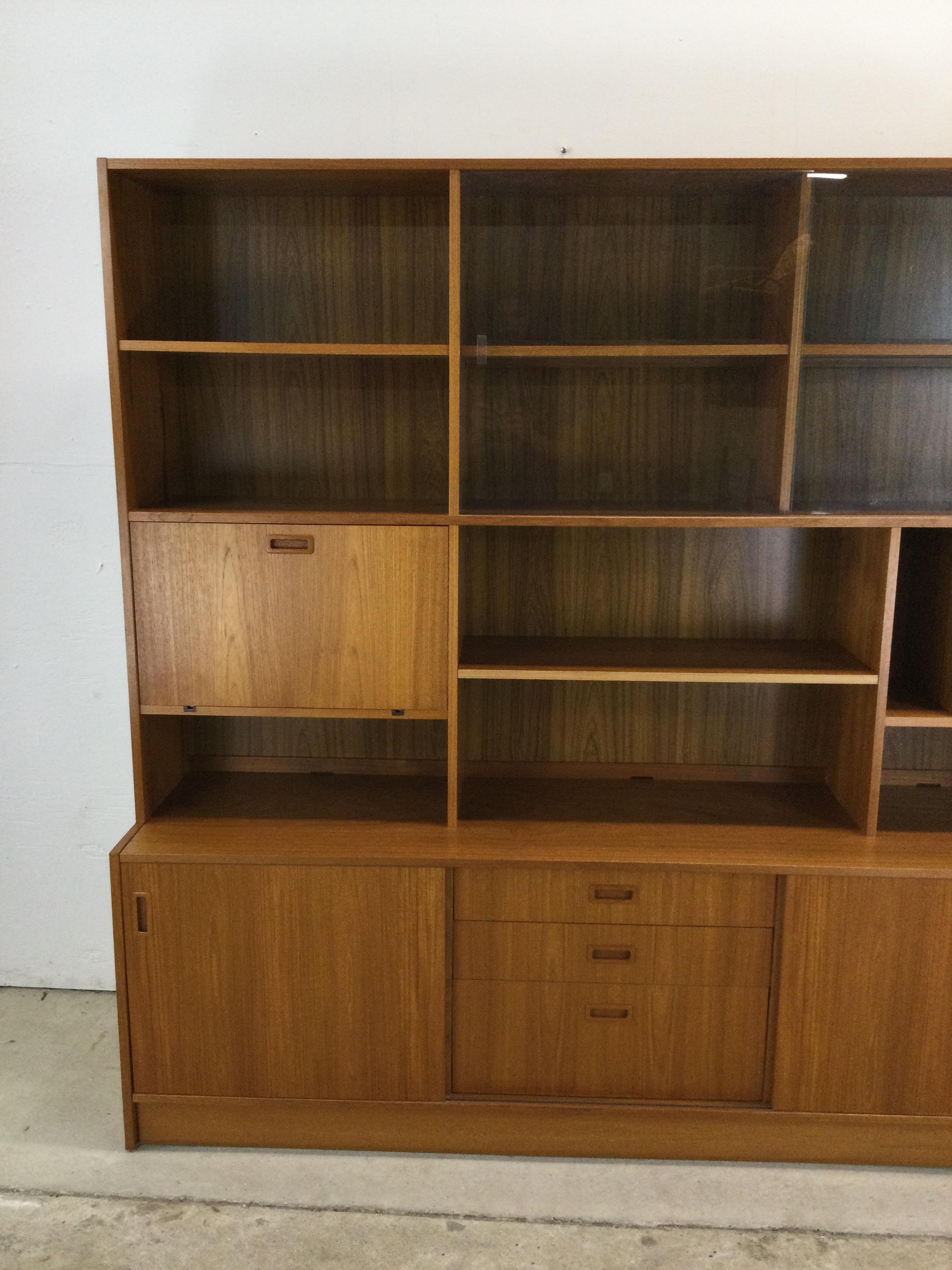 Danish modern shelving unit with sliding glass doors and drop front cabinet In Good Condition In Freehold, NJ