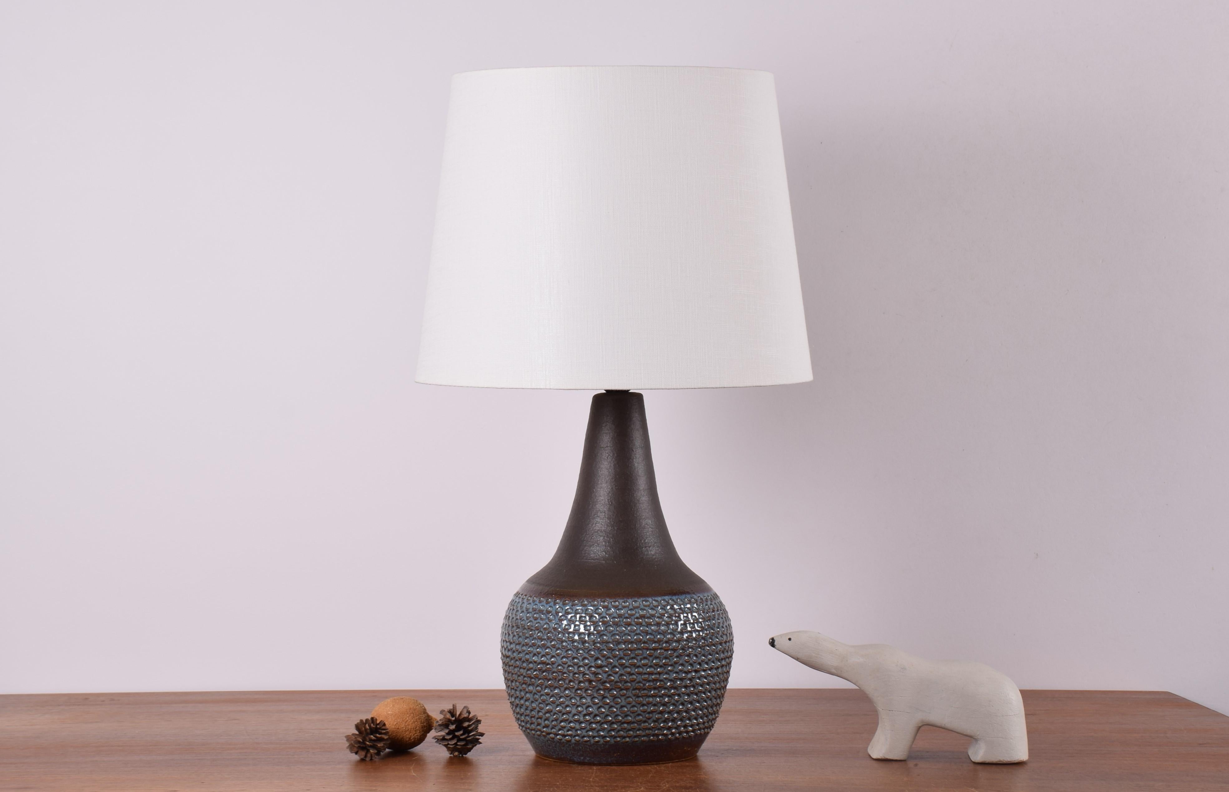 Midcentury tall budded table lamp designed by Einar Johansen for Danish stoneware manufacturer Søholm. Produced, circa 1960s.
This is a rare version of the model 3048, most likely an early, more detailed version.

The lamp has a dark matte brown