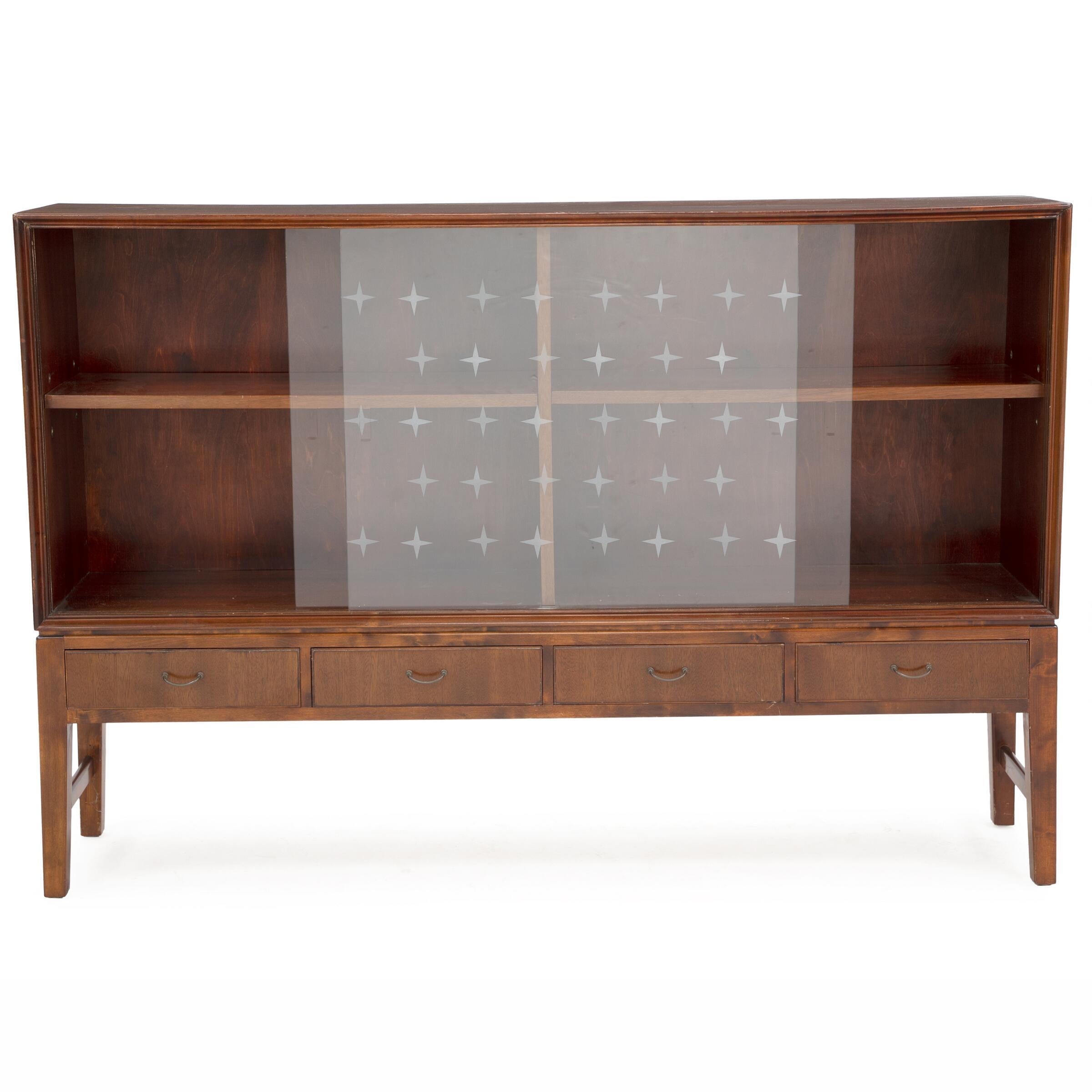 Danish Modern Showcase cabinet with sliding glass doors etched with star design, two shelves in mahogany. From retailer Holger Christensen, Copenhagen, in 1950's.