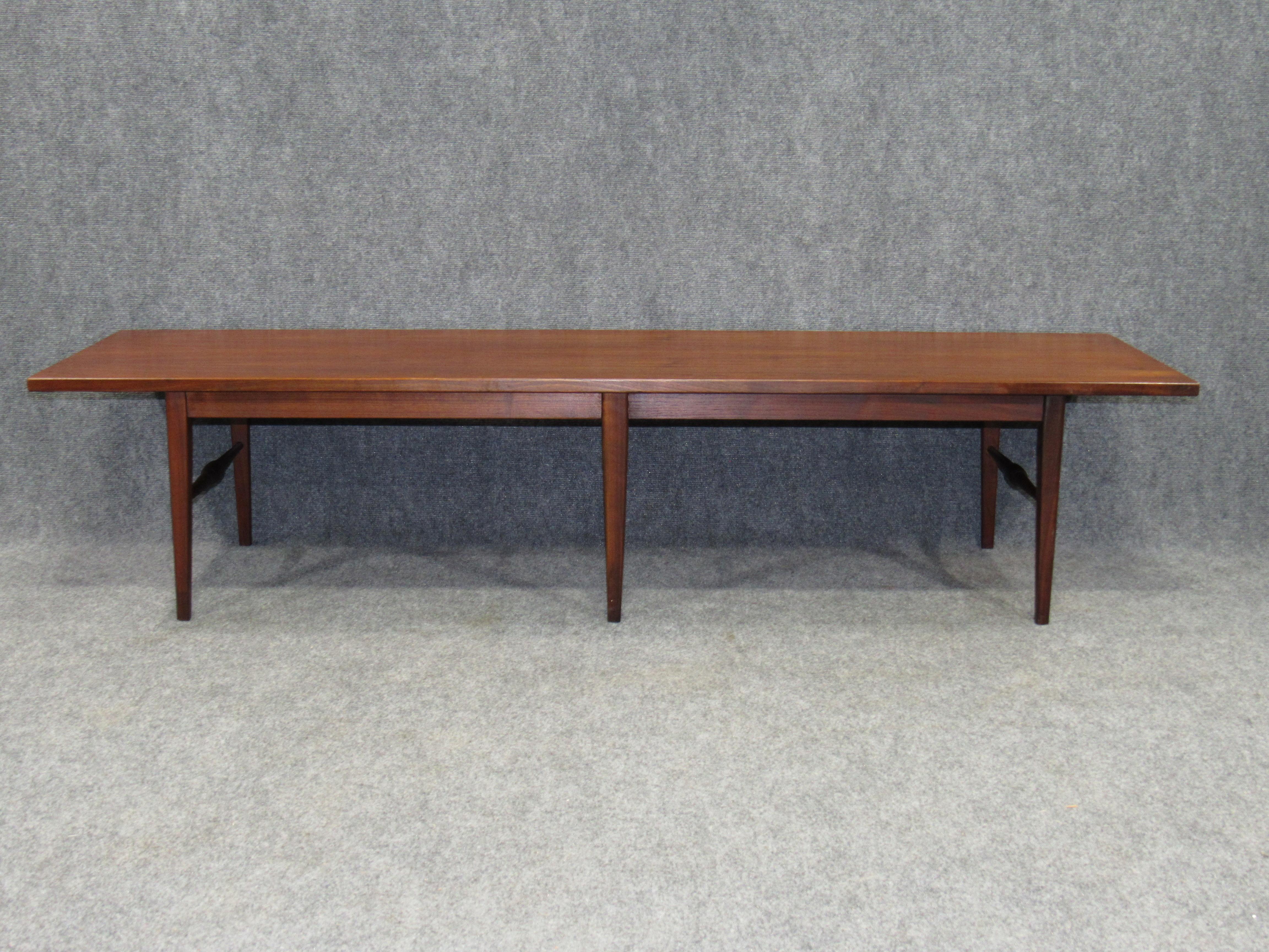 Danish modern six-legged rosewood coffee table. Excellent vintage condition.
