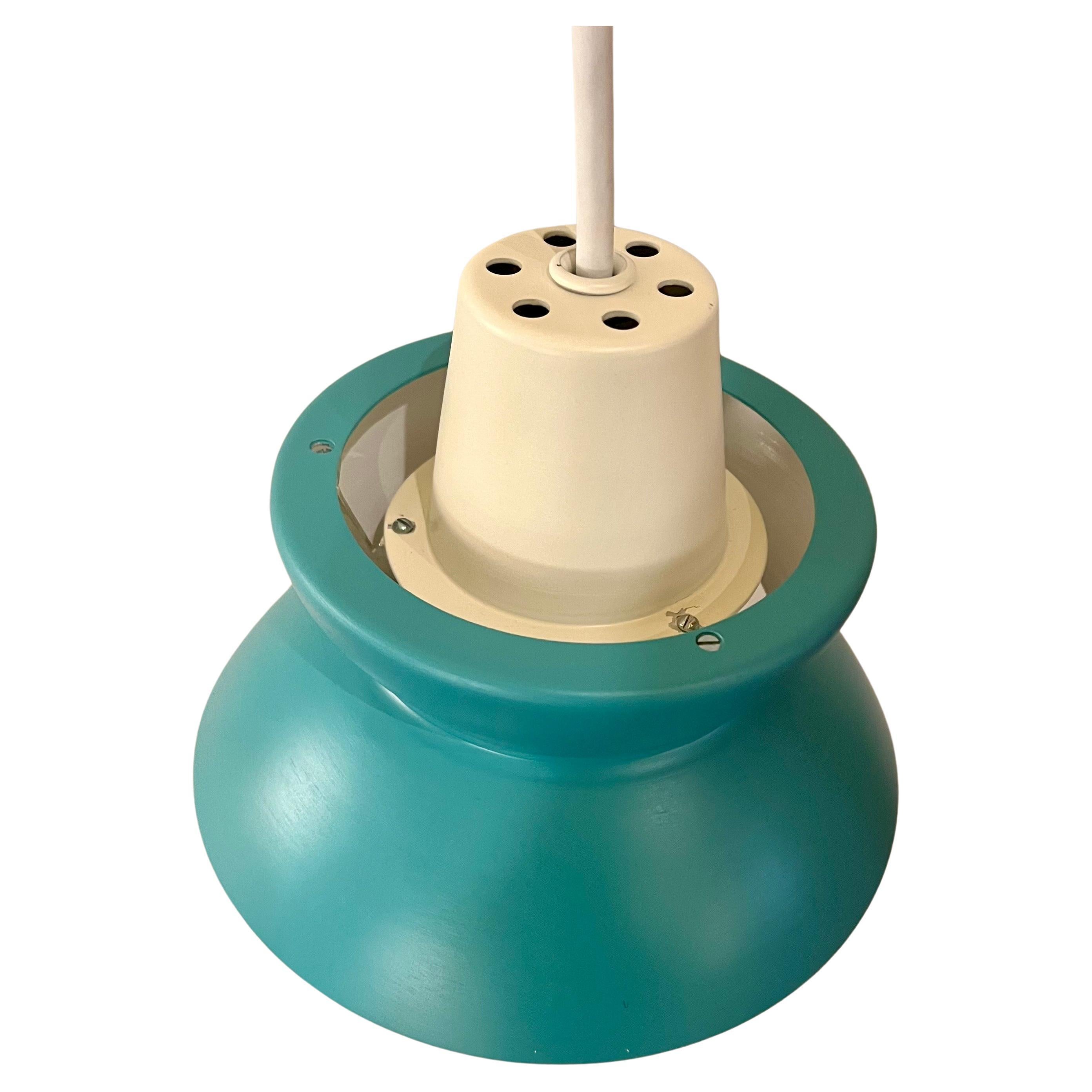 Beautiful condition on this small pendant lamp designed by Claus Bonderup & Torsten Thorup for Fog & Mørup, like new condition never used comes with canopy for celling new cord beautiful turquoise color with white enameled aluminium .
     