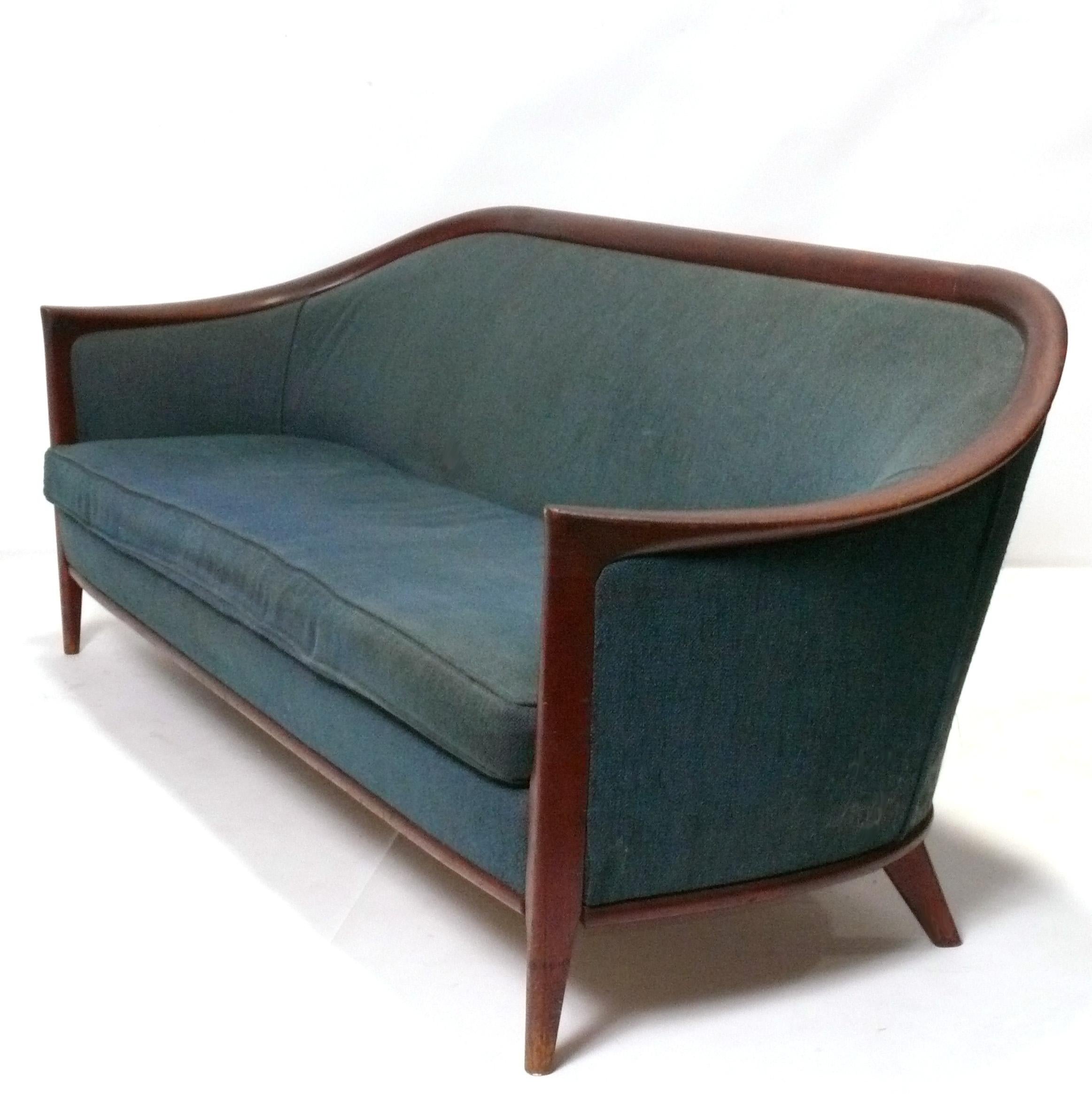 Curvaceous Danish Modern Sofa, designed by Bertil Fridhagen, Sweden, circa 1960s. It is currently being refinished and reupholstered, and can be completed in your fabric. Simply send us 14 yards of your fabric after purchase.