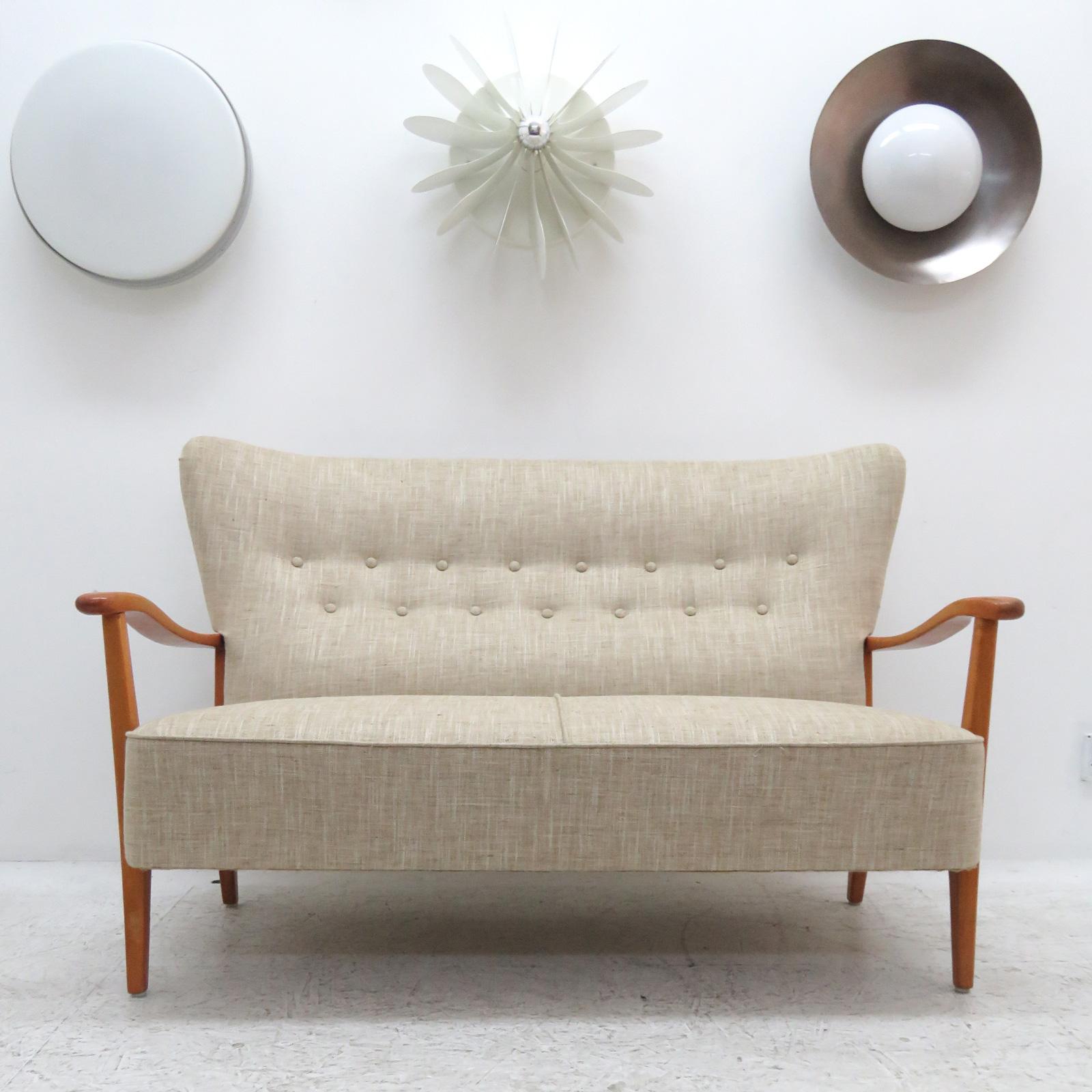 Wonderful Danish modern sofa by DUX, sculptural stained beech frame with professionally reupholstered body, The concave wing back is tufted and the seat is spring supported, marked. (see also LU848711950491 for matching highback chair &