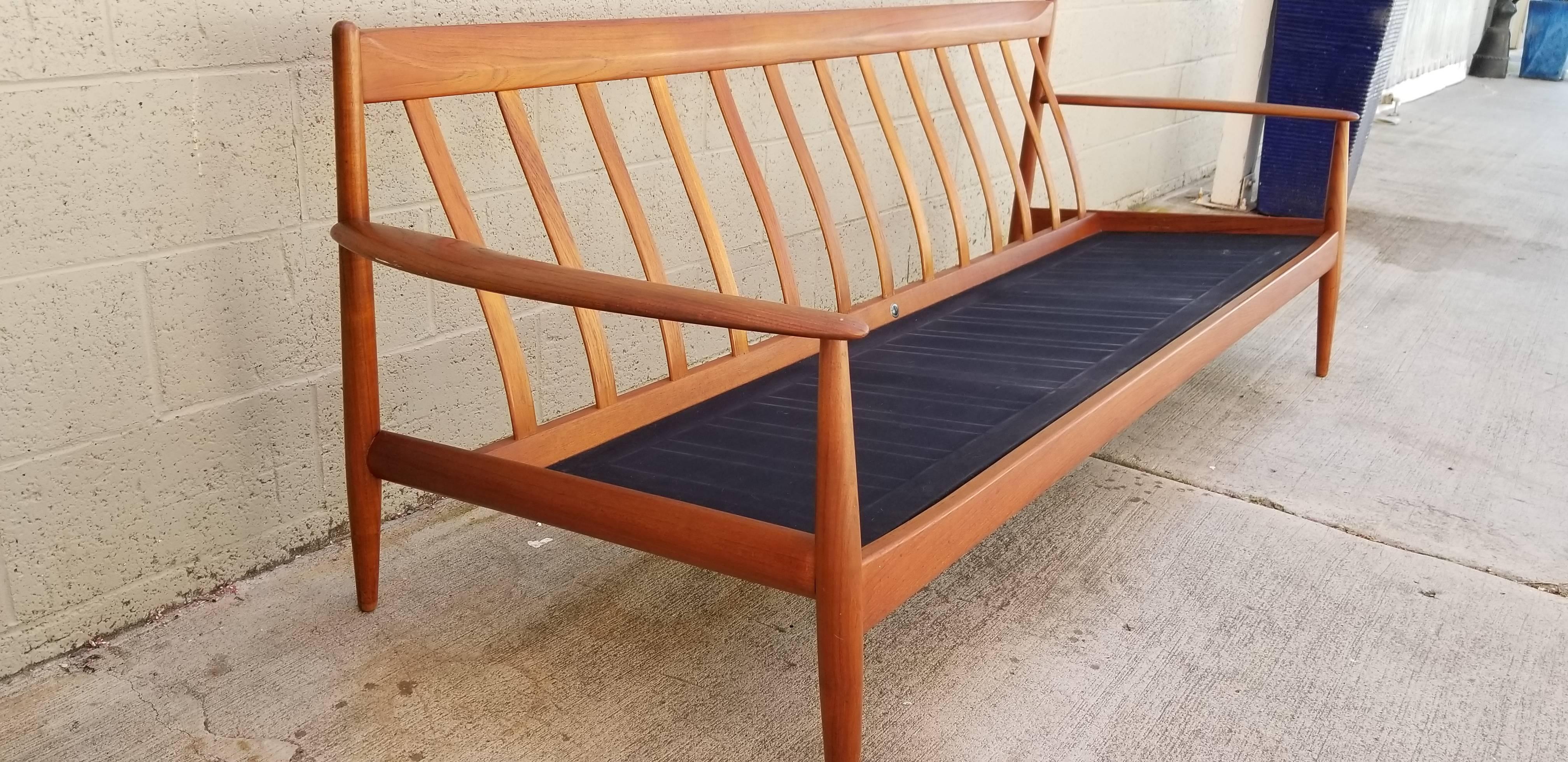 Teak Danish modern sofa designed by Grete Jalk for France & Daverkosen, Denmark, 1960s. Warm tone to teak frame. Clearly signed. In need of new upholstery. Original coil springs in good condition. Wear to dust cover fabric. Measure: Seat height 17