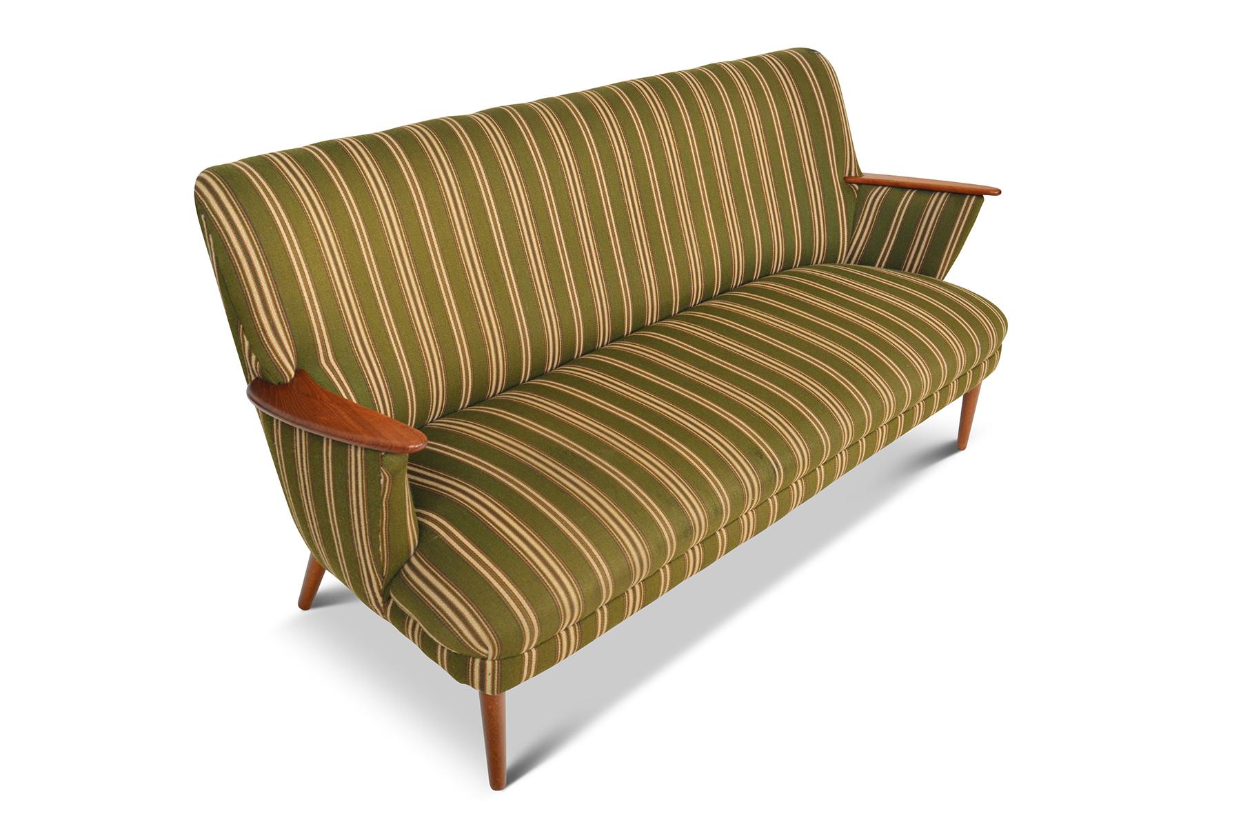 Origin: Denmark
Designer: Unknown
Manufacturer: Unknown
Era: 1960s
Materials: Teak
Measurements: 67? Width x 26? Depth x 31? Height

Condition: In excellent original condition. Fabric has some vintage wear. Price includes new upholstery in