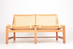 Danish Modern Sofa in Mahogany and Patinated Leather by Rud Thygesen., 1980s