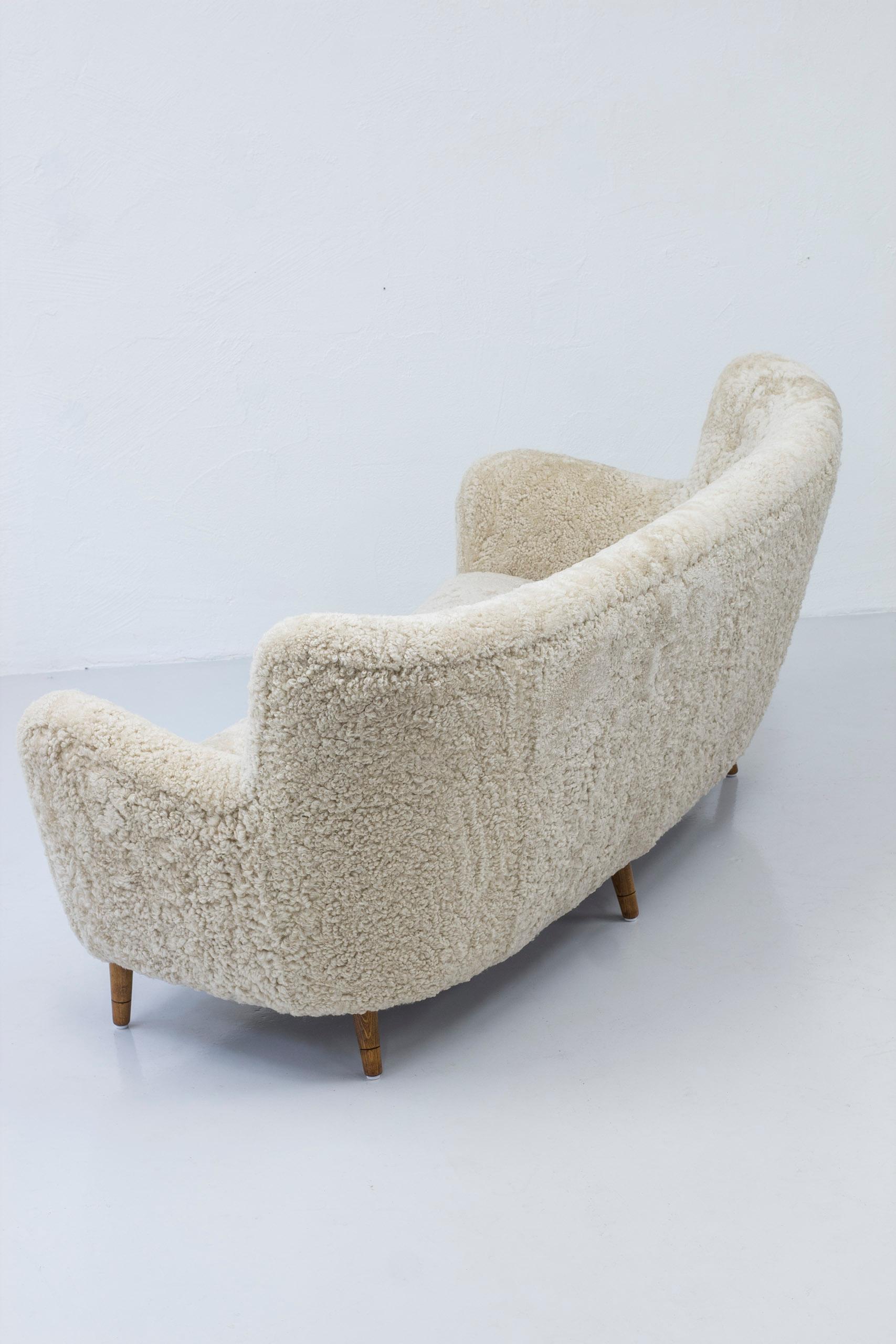Scandinavian Modern Danish Modern Sofa with Sheep Skin in the Manner of Finn Juhl