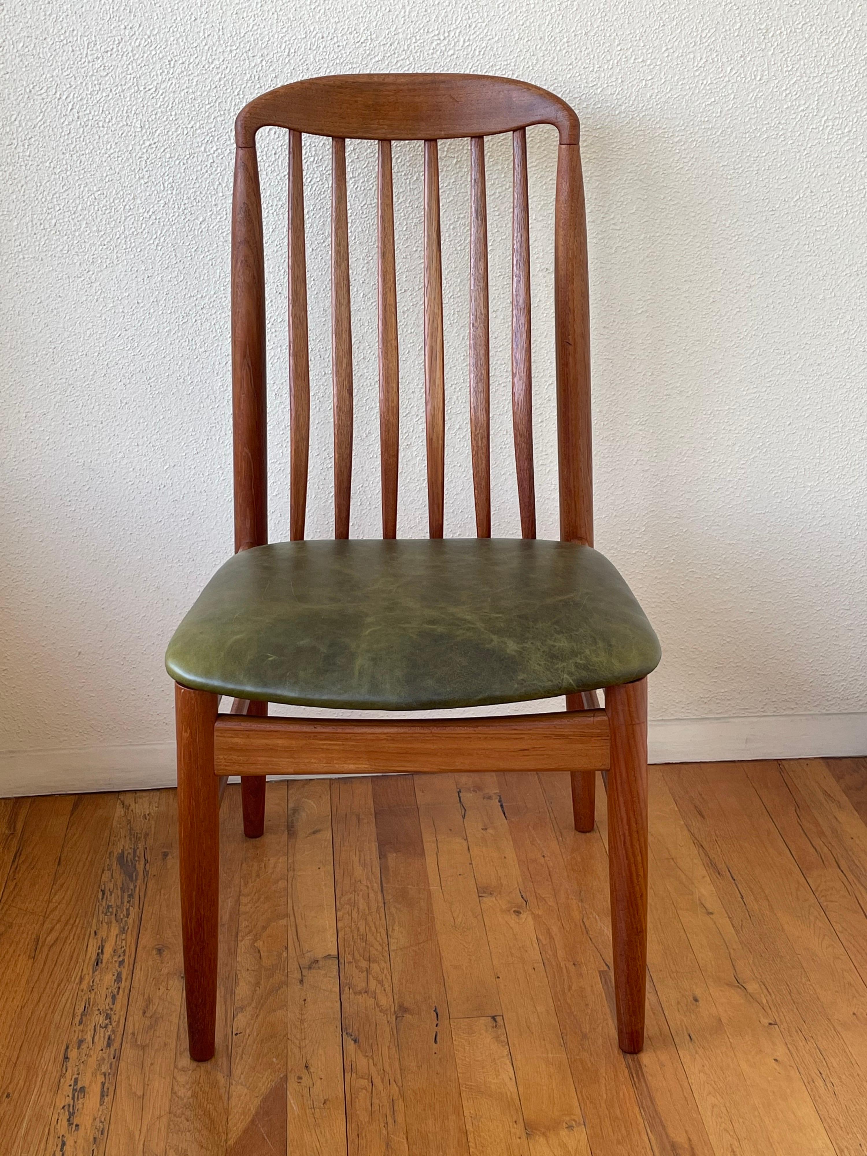 Beautiful elegant single desk chair in solid teak sculpted frame, with freshly upholstered Italian Olive green Napa Leather, solid sturdy we have restored the frame it's in very nice condition, circa 1960s.
