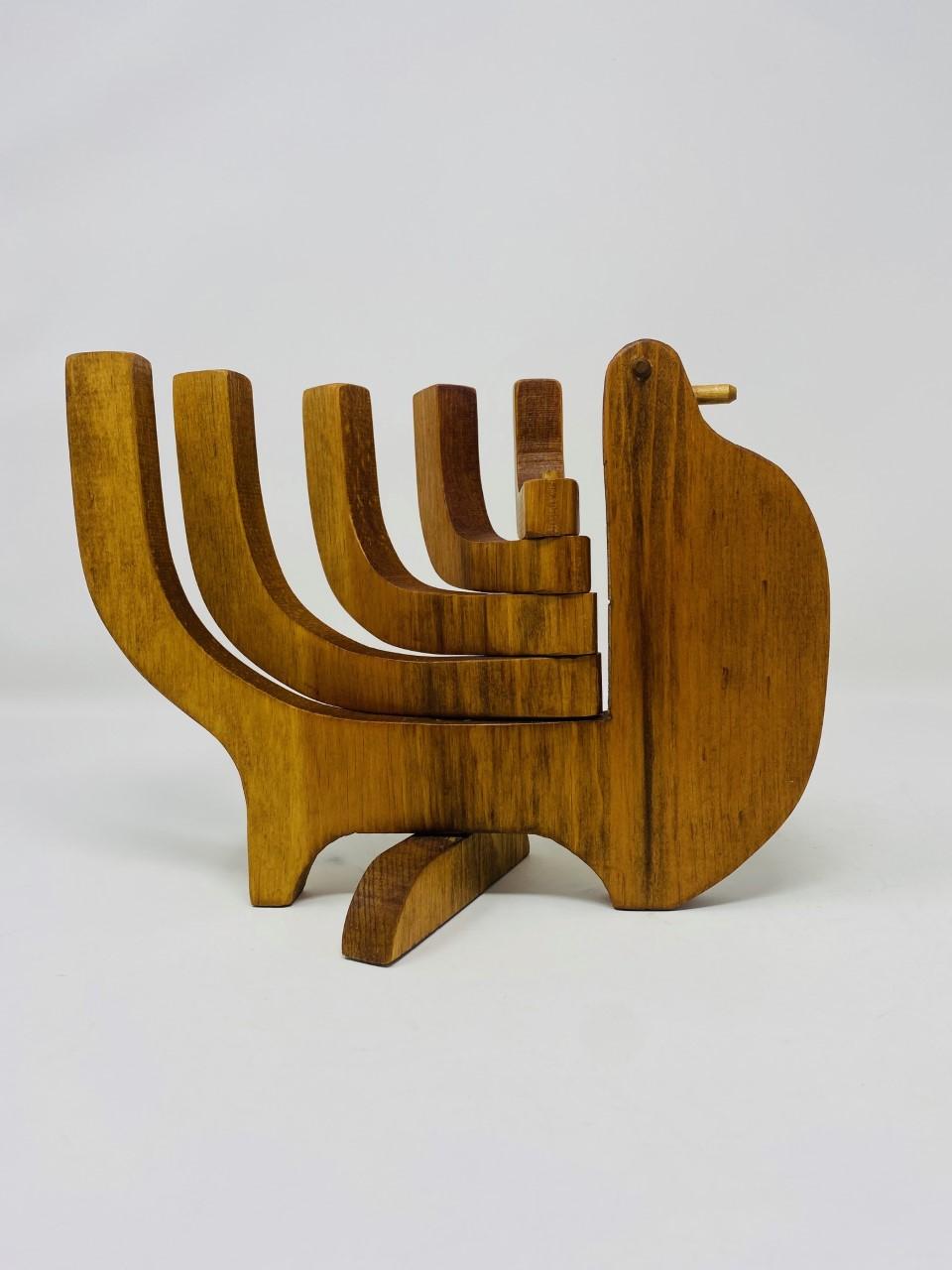 Beautiful and nostalgic candleholder. Whimsical versatile multiposition candleholder, solid teak five candle capacity 1/2