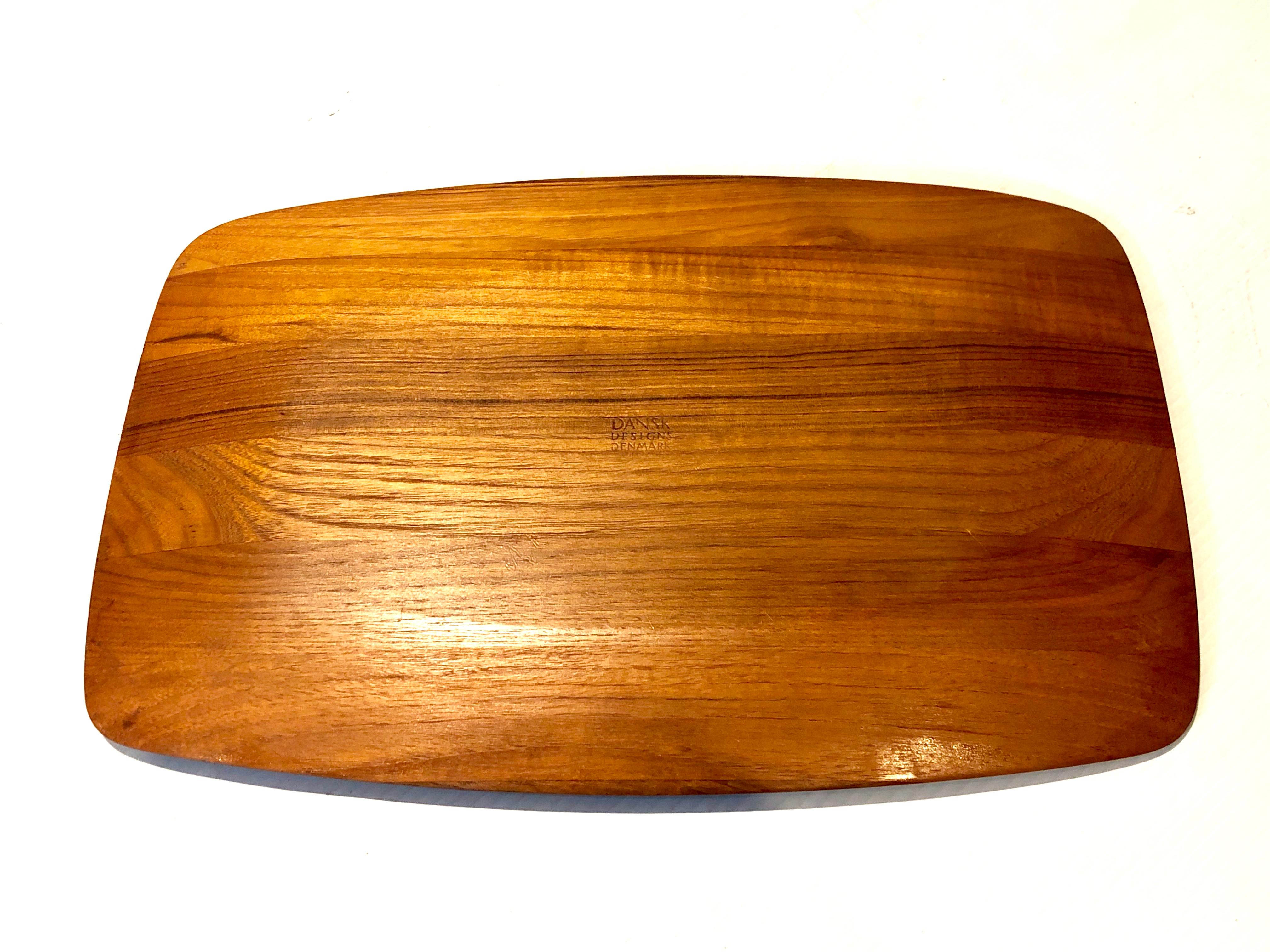 Great design on this solid teak tray designed by Quistgaard for Dansk, circa 1950s raised edge , and butcher block center great condition. Early production Made in Denmark.