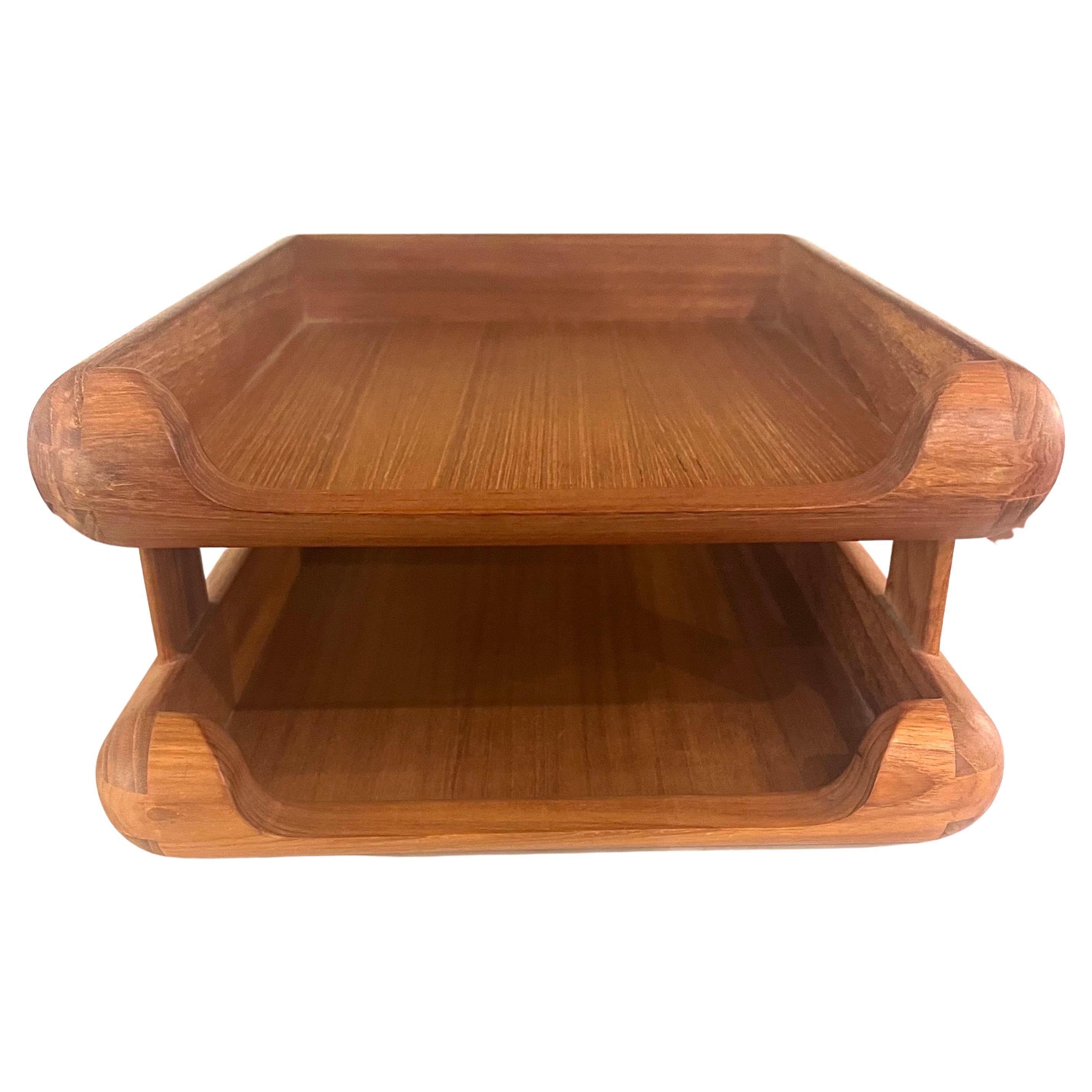 Very cool and functional Danish modern teak double letter desk tray circa the 1980s. The trays are made of dovetailed solid teak. The piece is in very good condition and would make a great addition to any midcentury office.