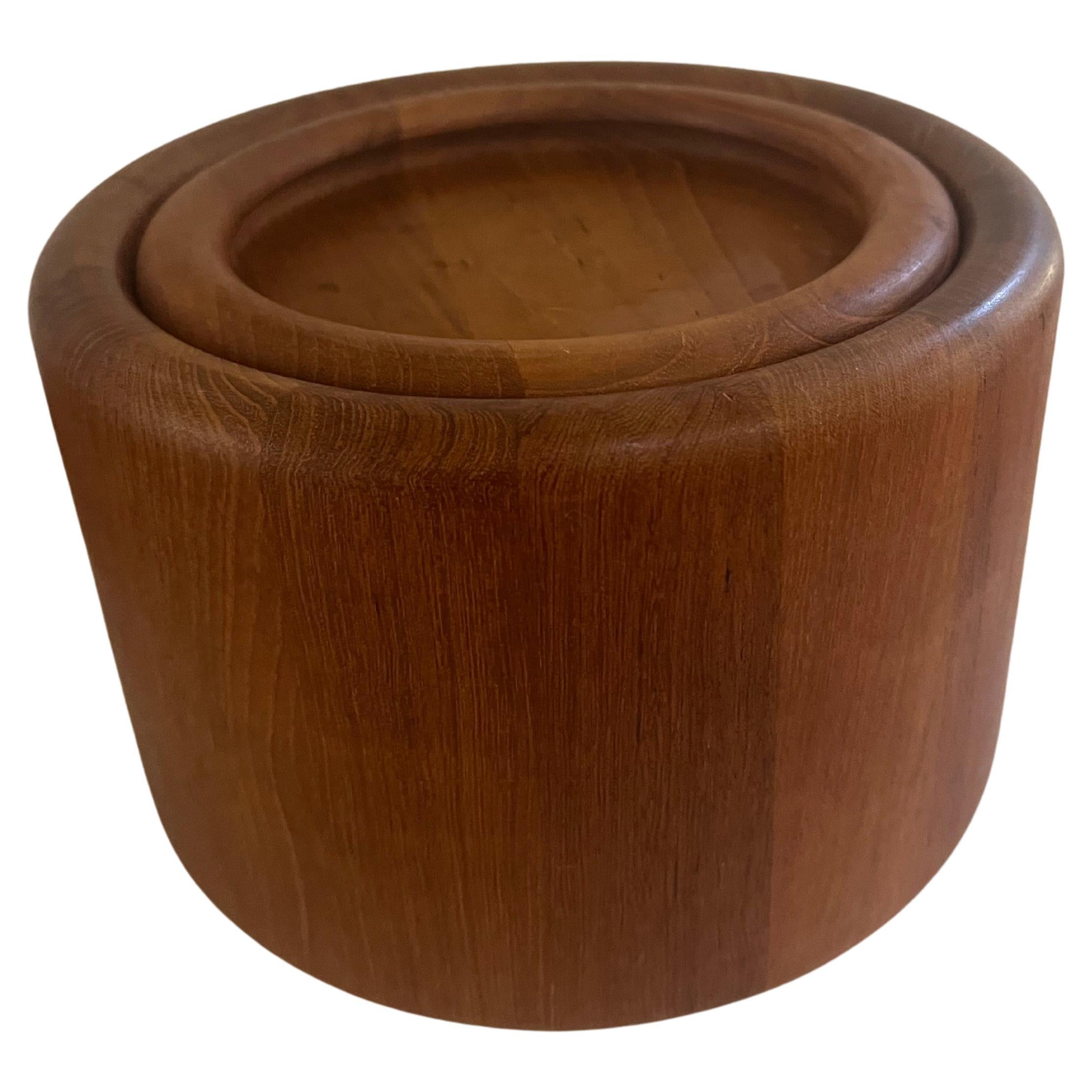 Beautiful simple solid teak ice bucket by Nissen Denmark, with orange plastic insert in excellent condition. great for Danish Modern Mid-century Home Decor.