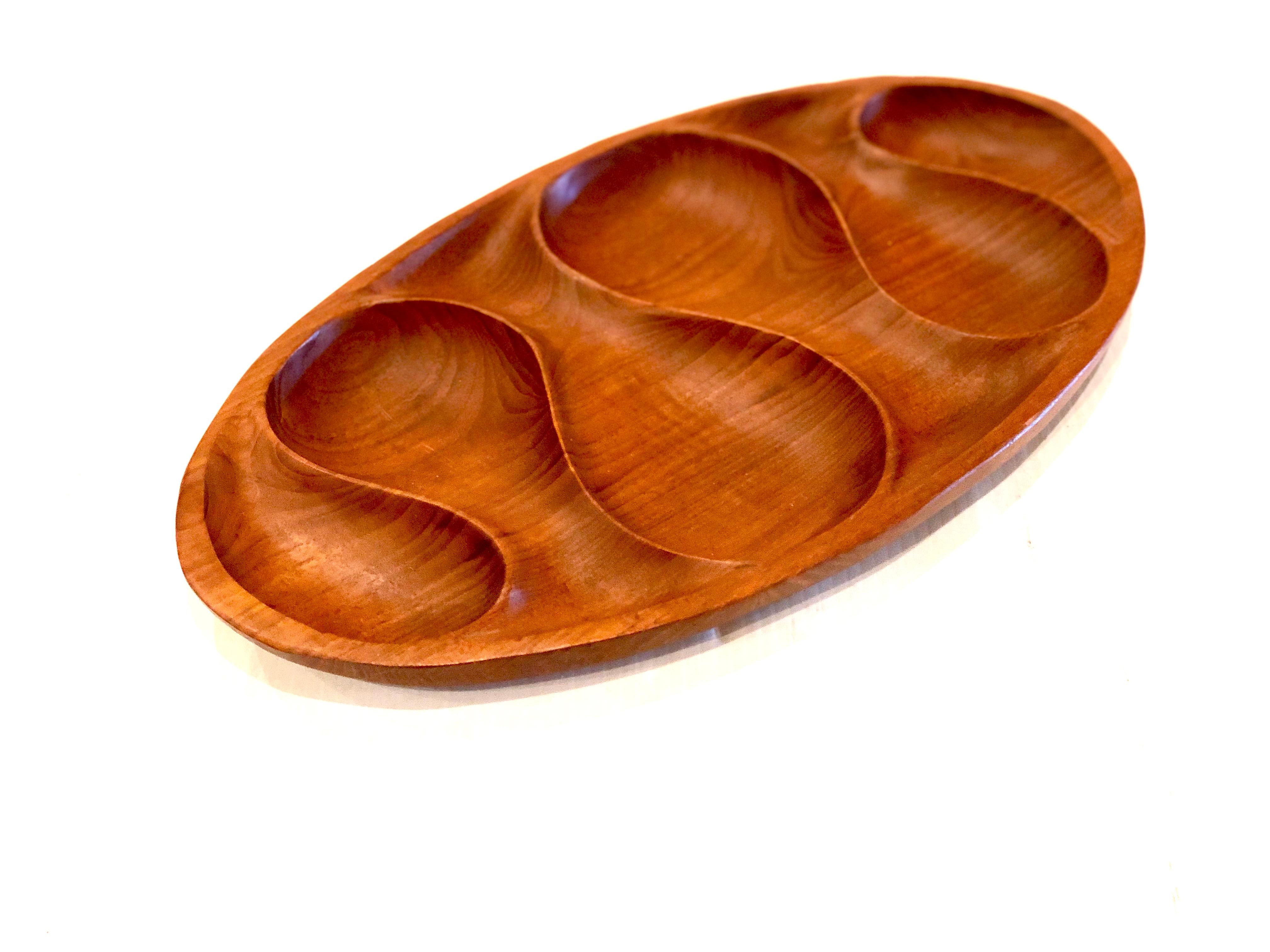 Beautiful solid teak with carved zig-zag insert shape, circa 1960s.