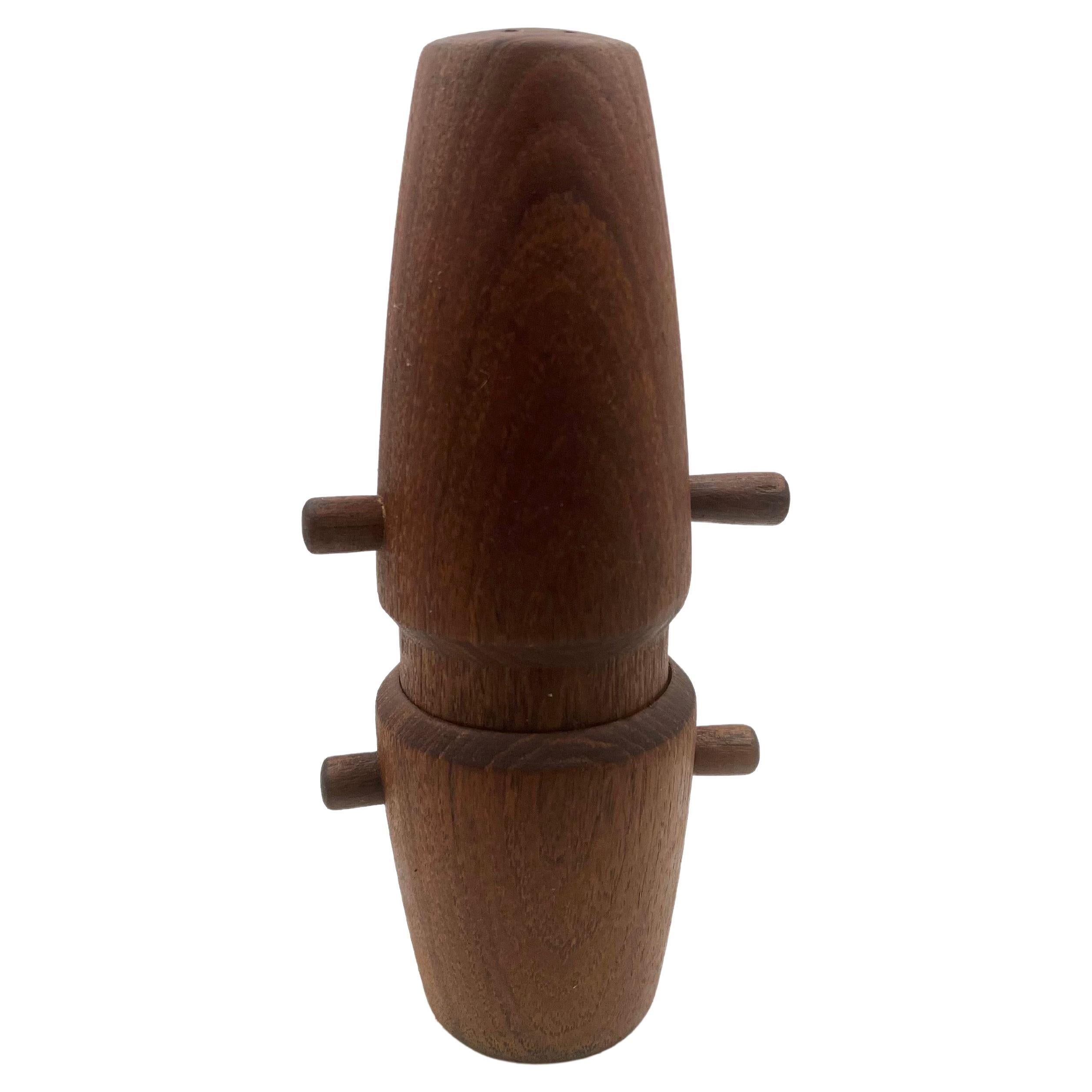 Early production on this solid teak salt and peppermill designed by Quistgaard for Dansk, a beautiful design. with removable wood plugs and Peugeot French metal movement.