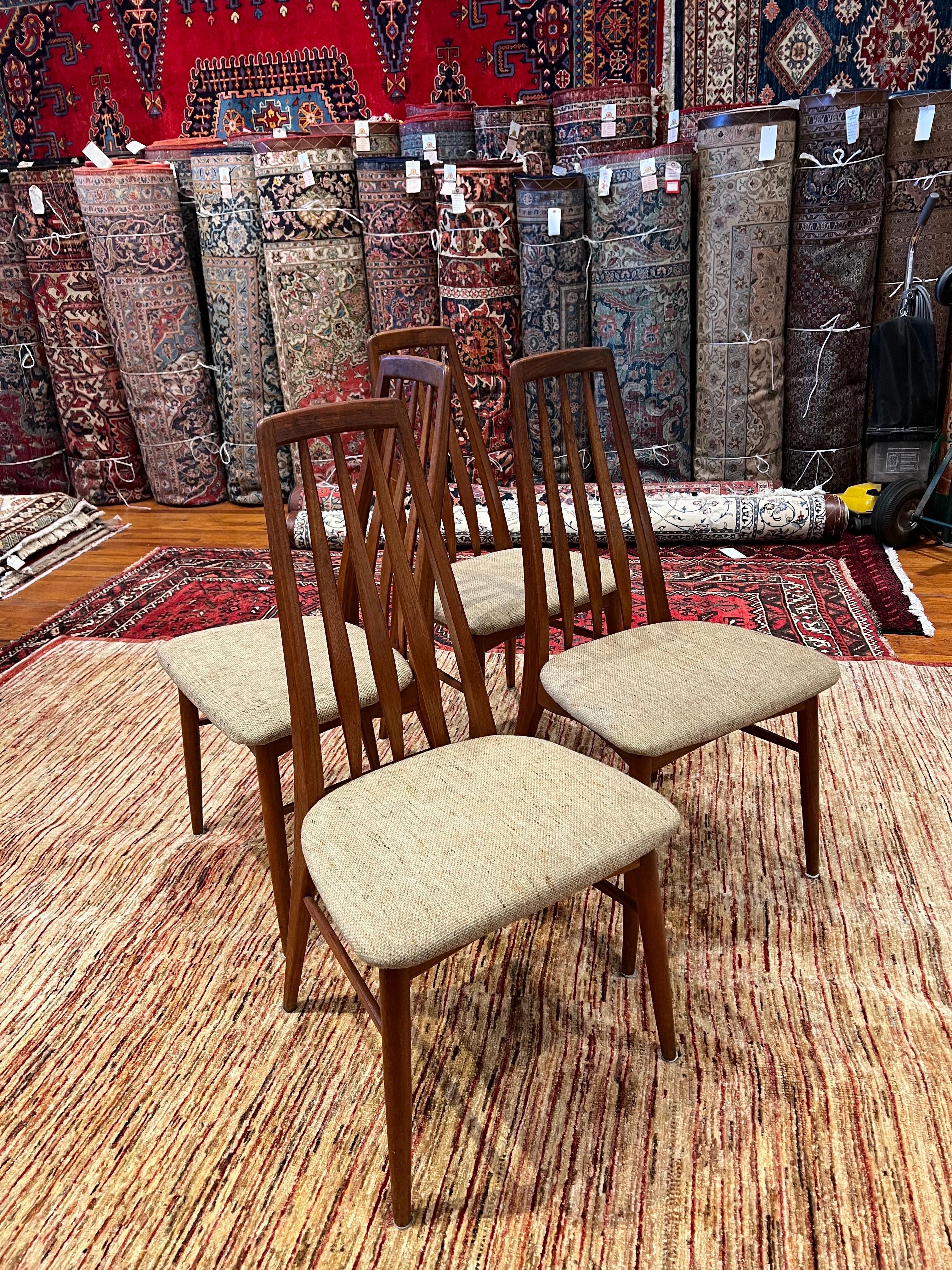 A classic set of six Eva chairs designed by Niels Koefoed, circa the 1960s in solid teak and oatmeal color original fabric. We have clean each chair with solid and sturdy construction. The original fabric retains its original label. The set comes