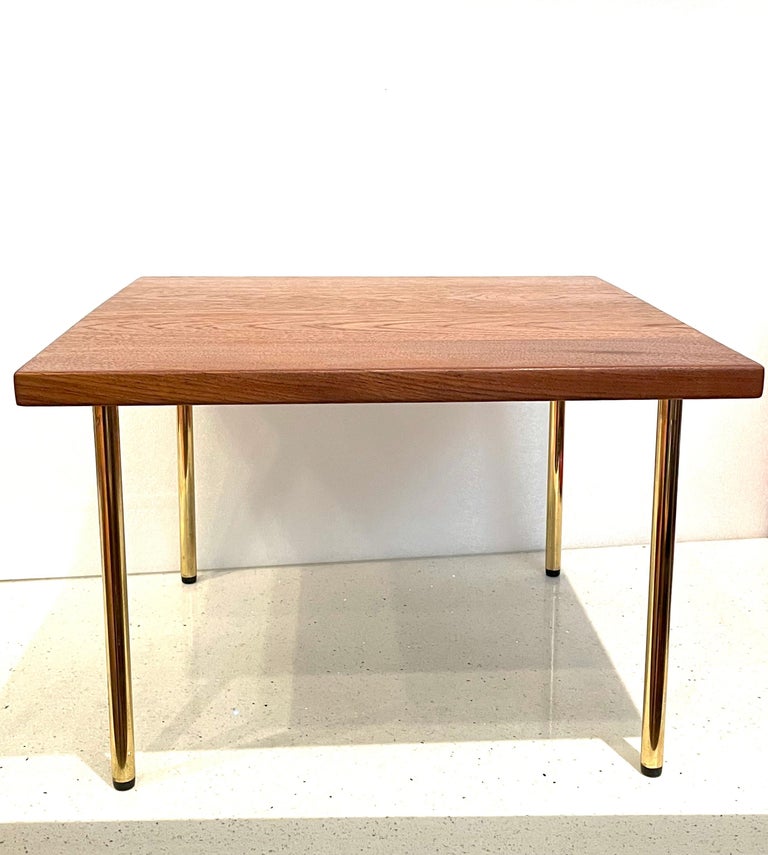 Simple elegant petite table designed by Peter Hvidt for France & Sons, circa 1950's imported by Jhon Stuart nice clean condition solid and sturdy.