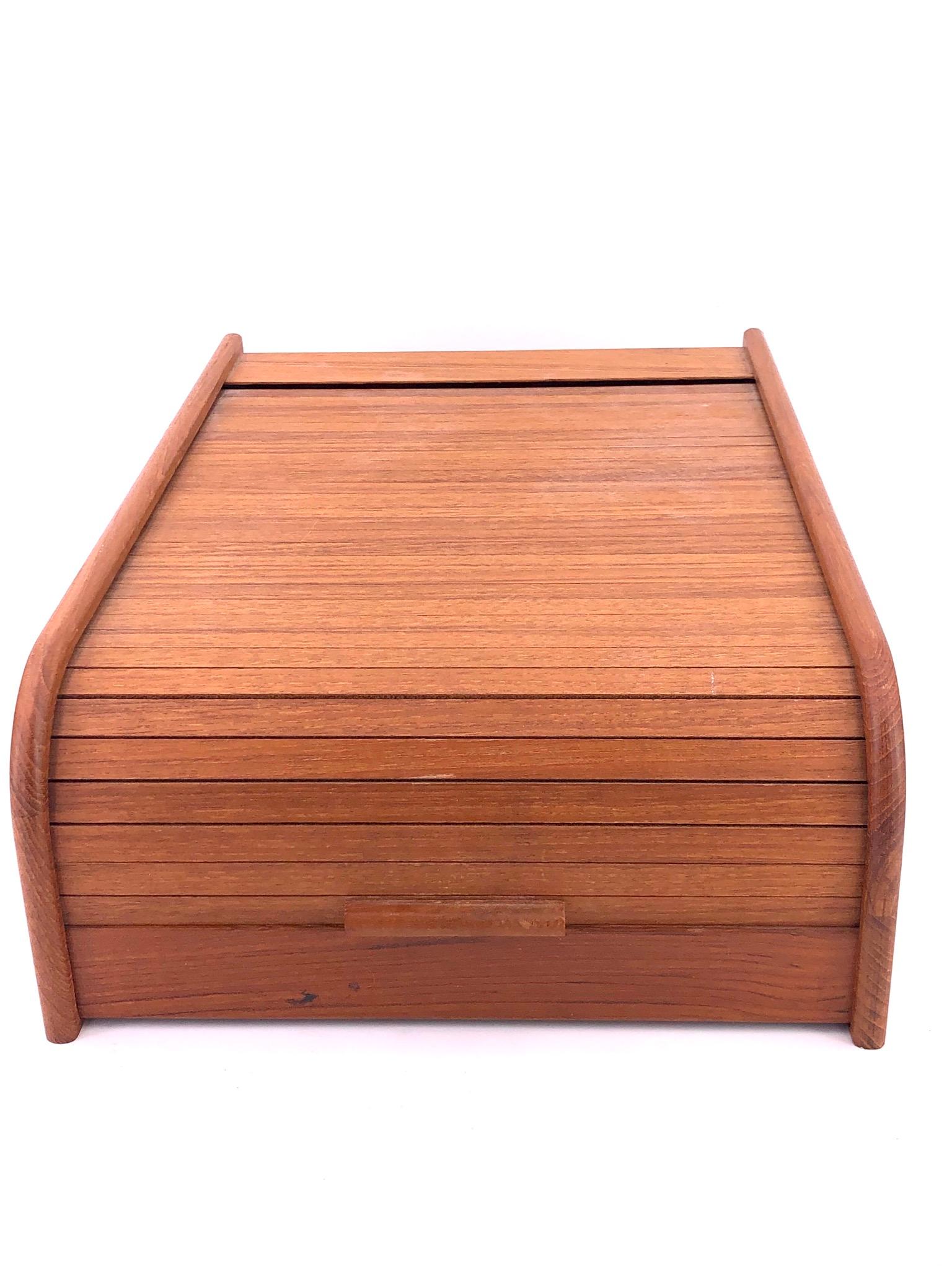 Danish modern solid teak tambour door trinket box, beautiful well crafted box desk top great for small storage. With roll top.
 