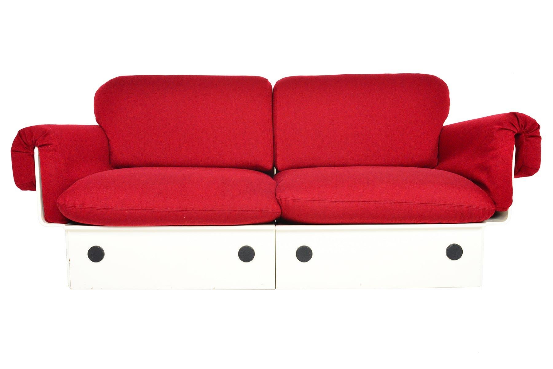 Designed at the height of the Space Age, this Danish modern loveseat offers a stunning silhouette and lounge worthy seating. A molded, white lacquer wood frame holds six cushions. Inside the frame, four casters allow this piece to be easily