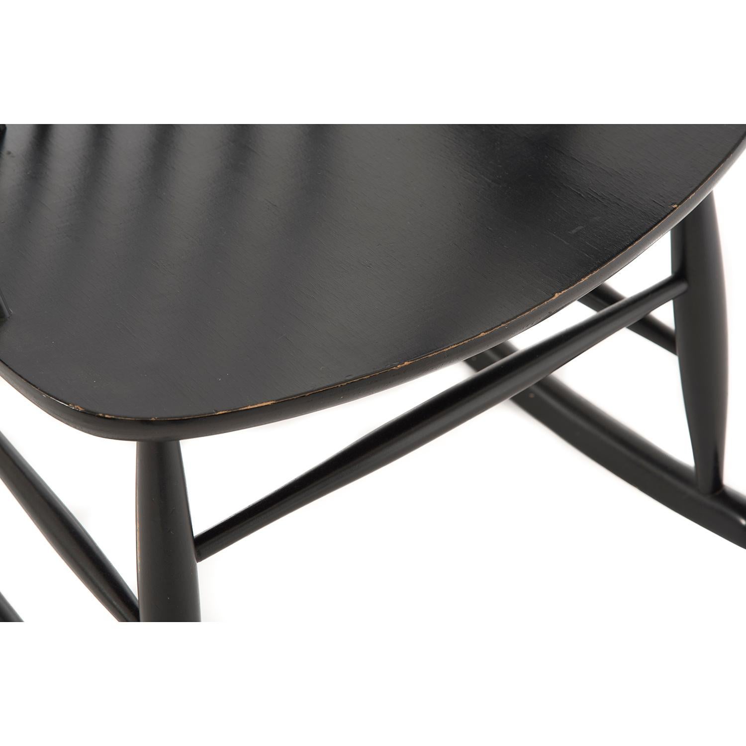 Scandinavian Modern Danish Modern Spindle Backed Wooden Rocking Chair