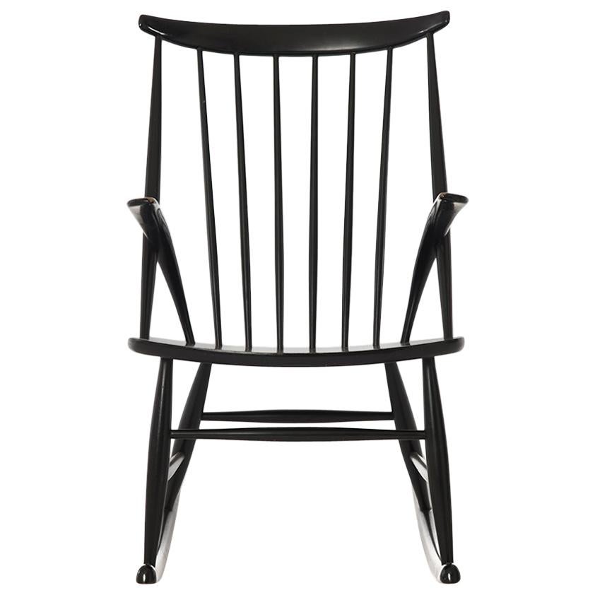 Danish Modern Spindle Backed Wooden Rocking Chair