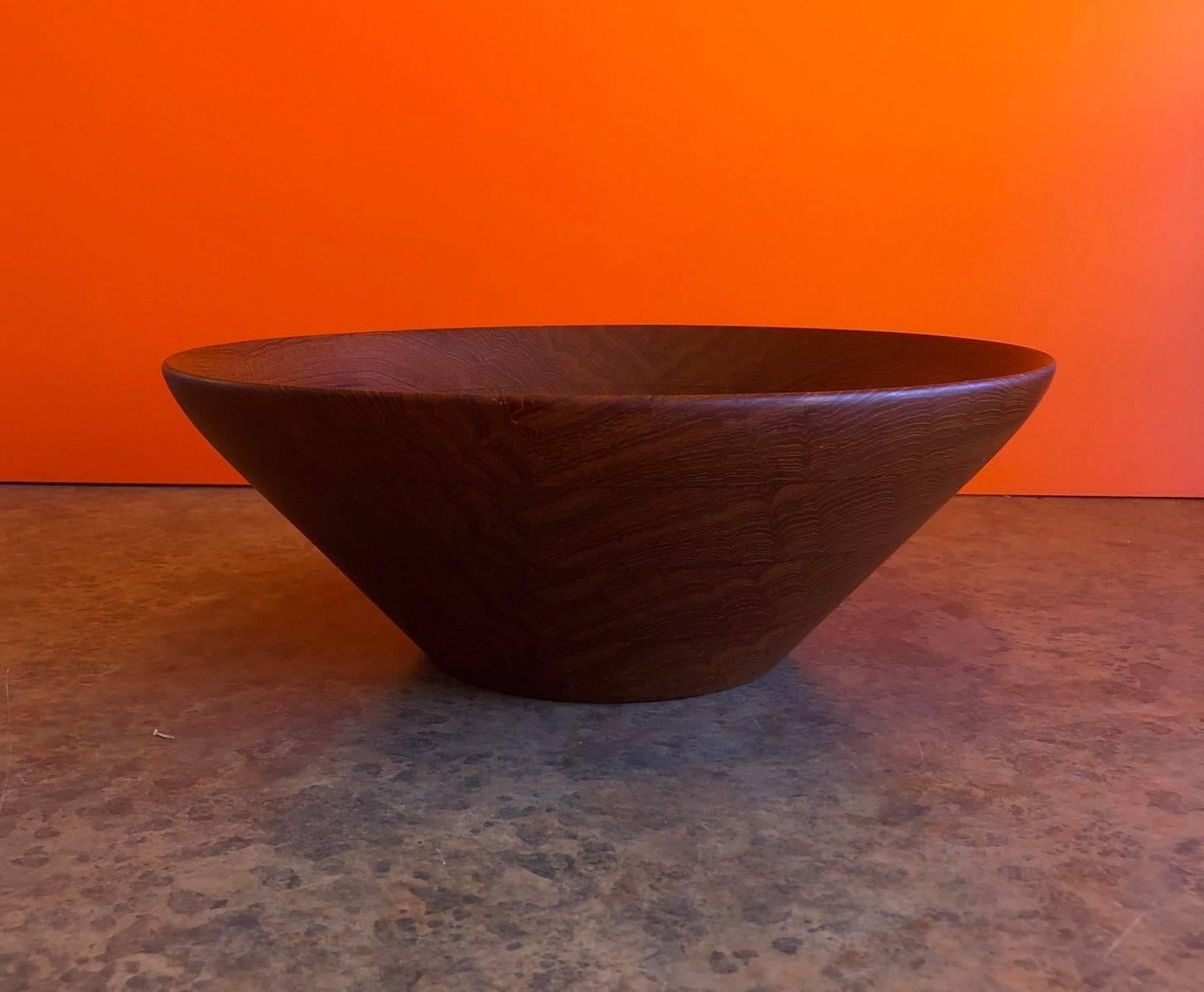 Danish modern staved teak bowl by Digsmed, circa 1960s. The bowl, which measures 12