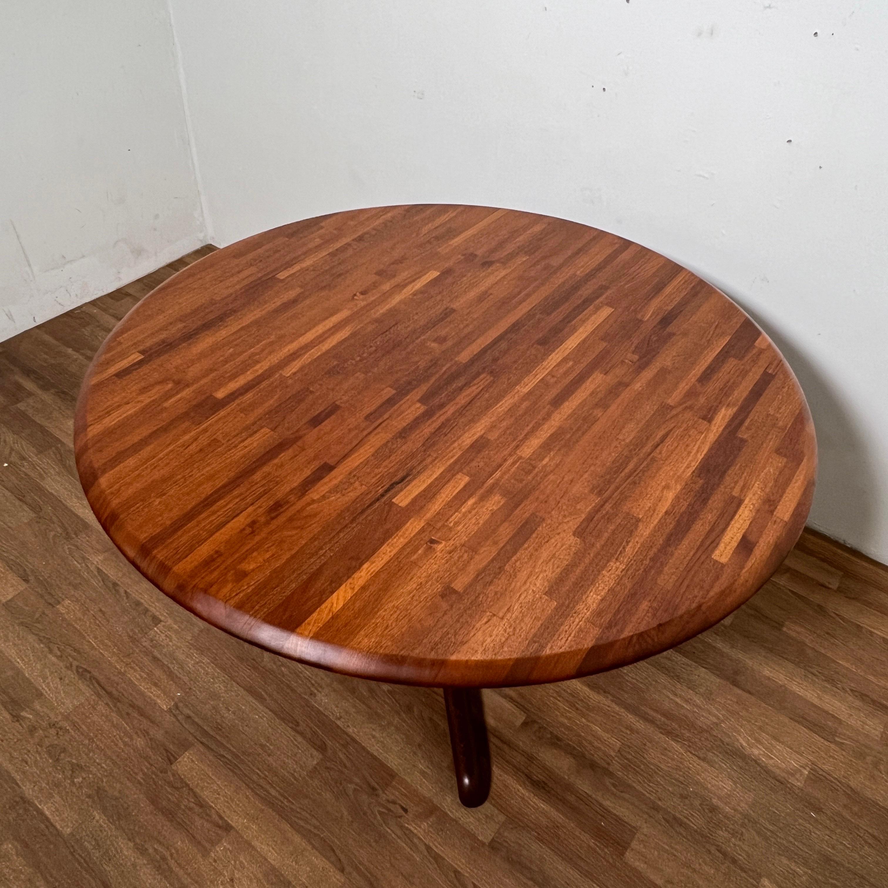 A circular Danish dining table of just under 48