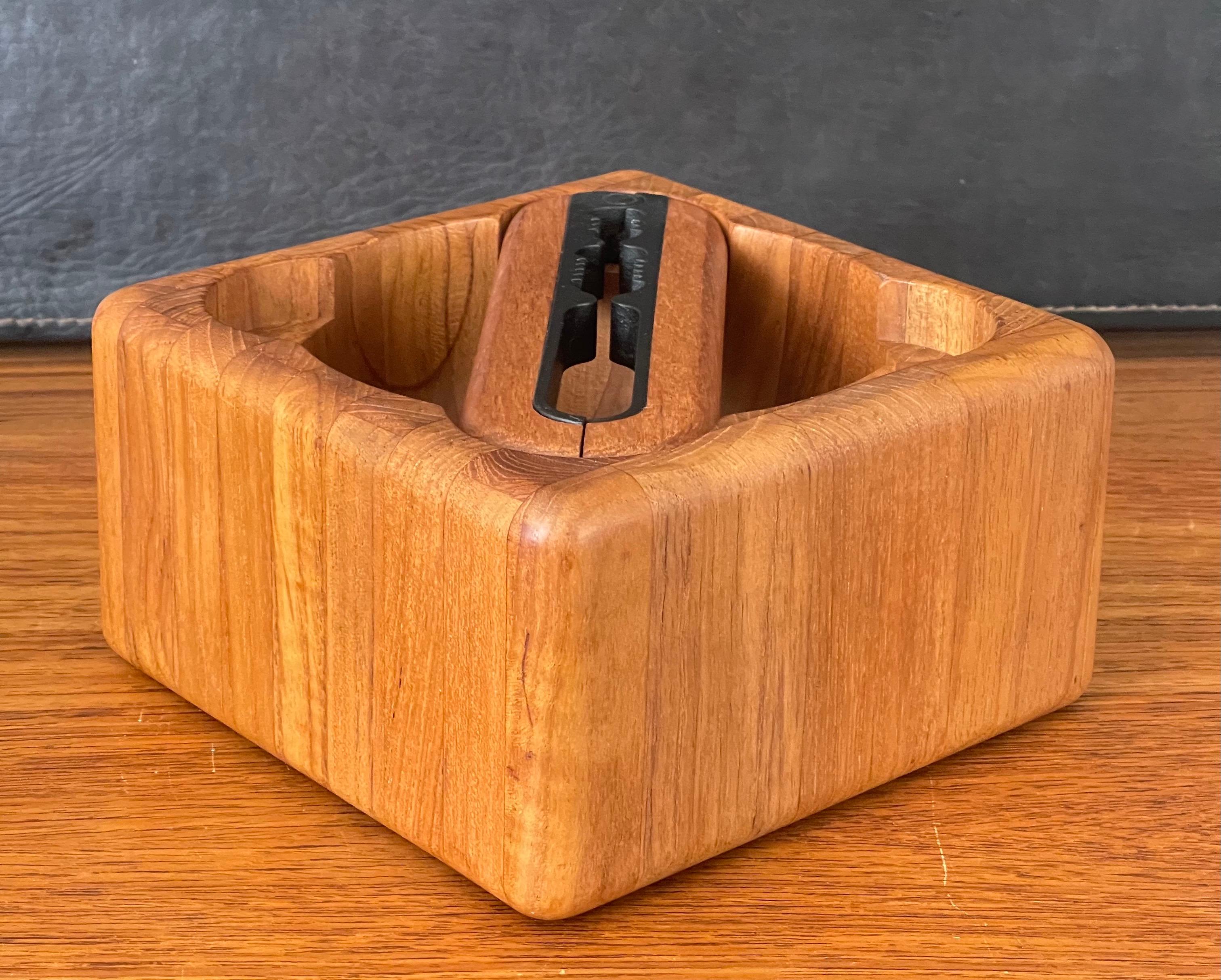 A very rare Danish modern staved teak nutcracker & bowl by Flemming Digsmed for Nissen, circa 1960s. The set is simple and elegant with great design and measures 7