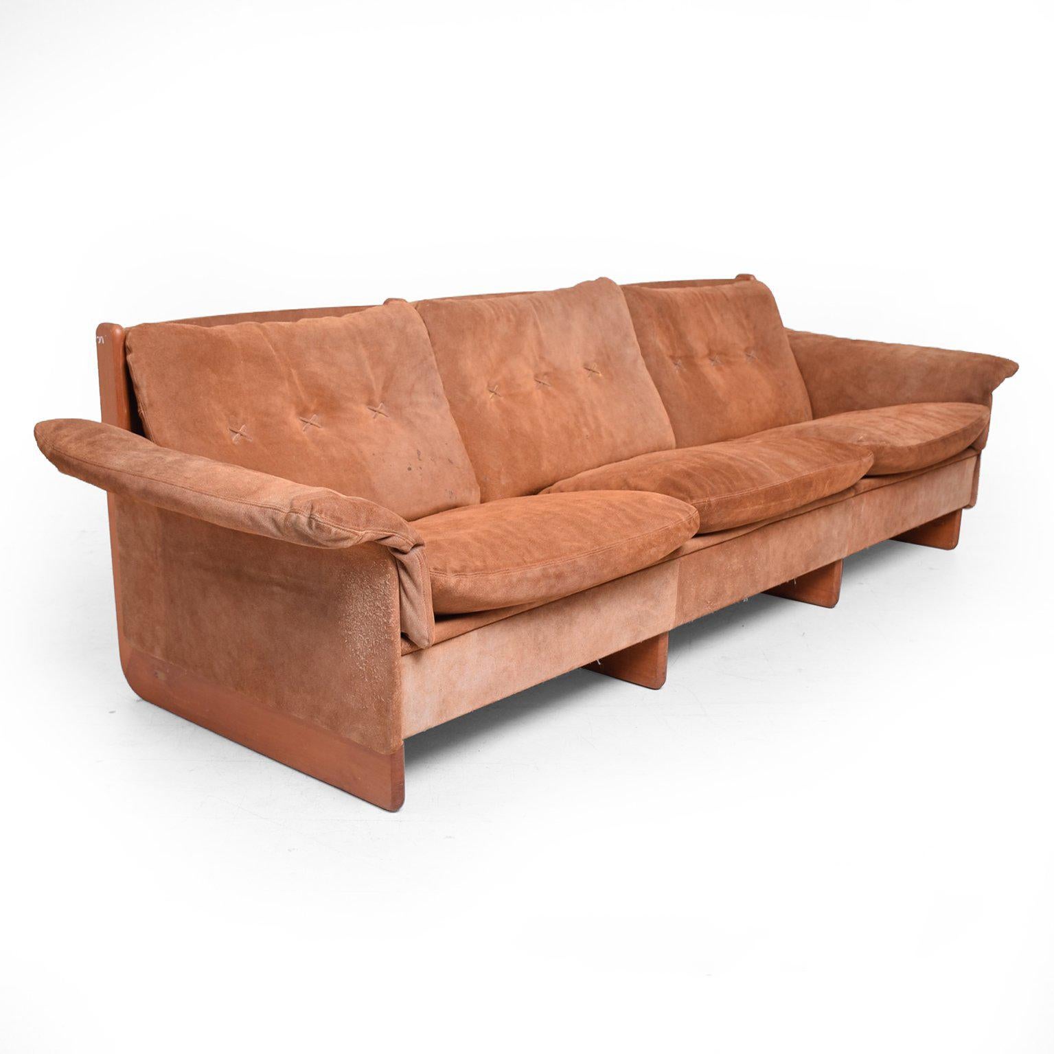For your consideration a Danish modern sofa constructed with suede in medium brown tones with angled design of teakwood. 

Stamped made in Denmark. 