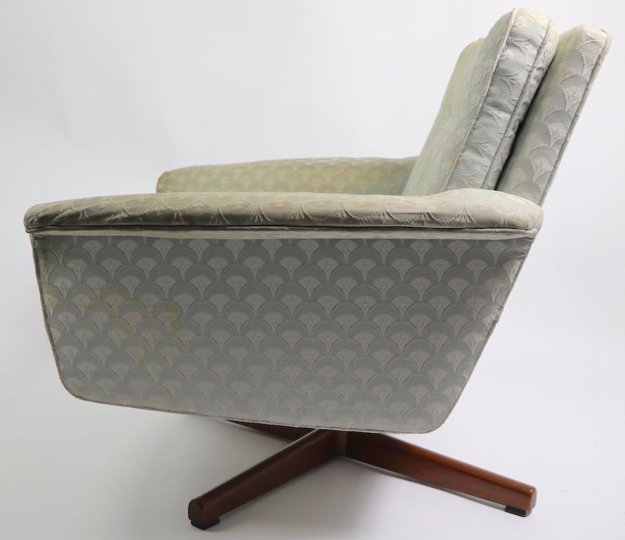 Scandinavian Modern Danish Modern Swivel Chair and Ottoman Attributed to DUX