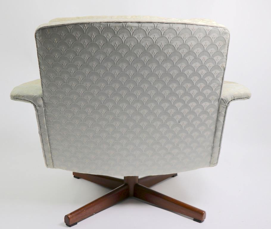 Danish Modern Swivel Chair and Ottoman Attributed to DUX In Fair Condition In New York, NY