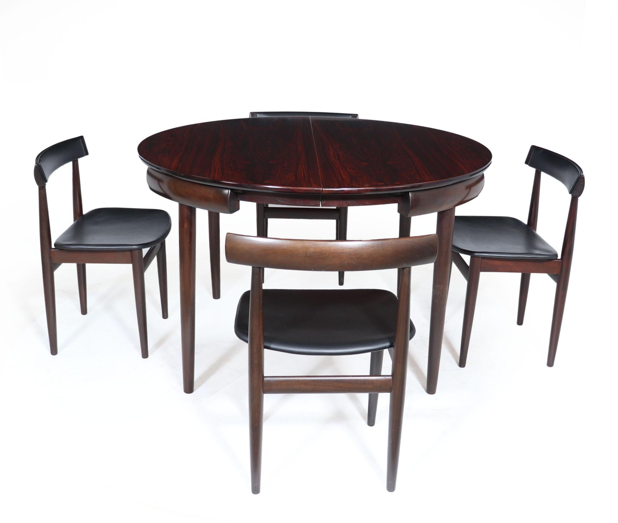 The roundette table and chairs by frem rojle.
A set of four dining chairs and extendable dining table designed by Hans Olsen and produced by Frem Rojle in the 1960s in Denmark, “The Roundette” rarely seen is this four legged chair version with