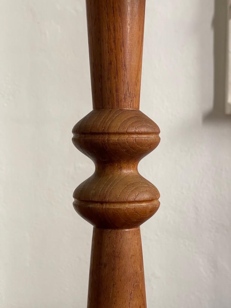 Danish modern table lamp in one solid piece of carved teak wood. Denmark 1950s For Sale 1