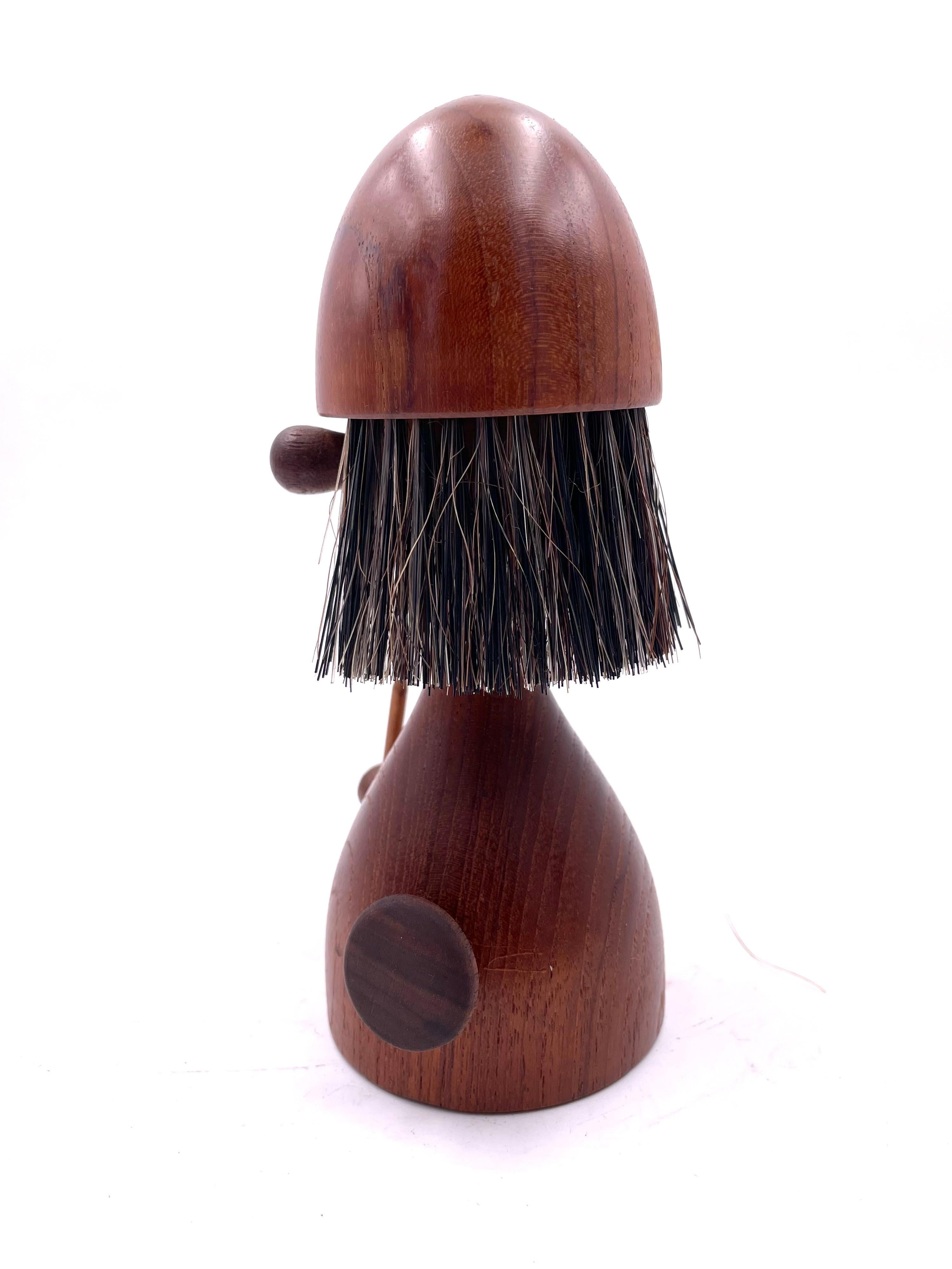 Very cool Viking clothes brush by Laurids Longborg, circa 1950's this piece its a sculpture by itself made of solid teak and mixed woods. a great piece of conversation.