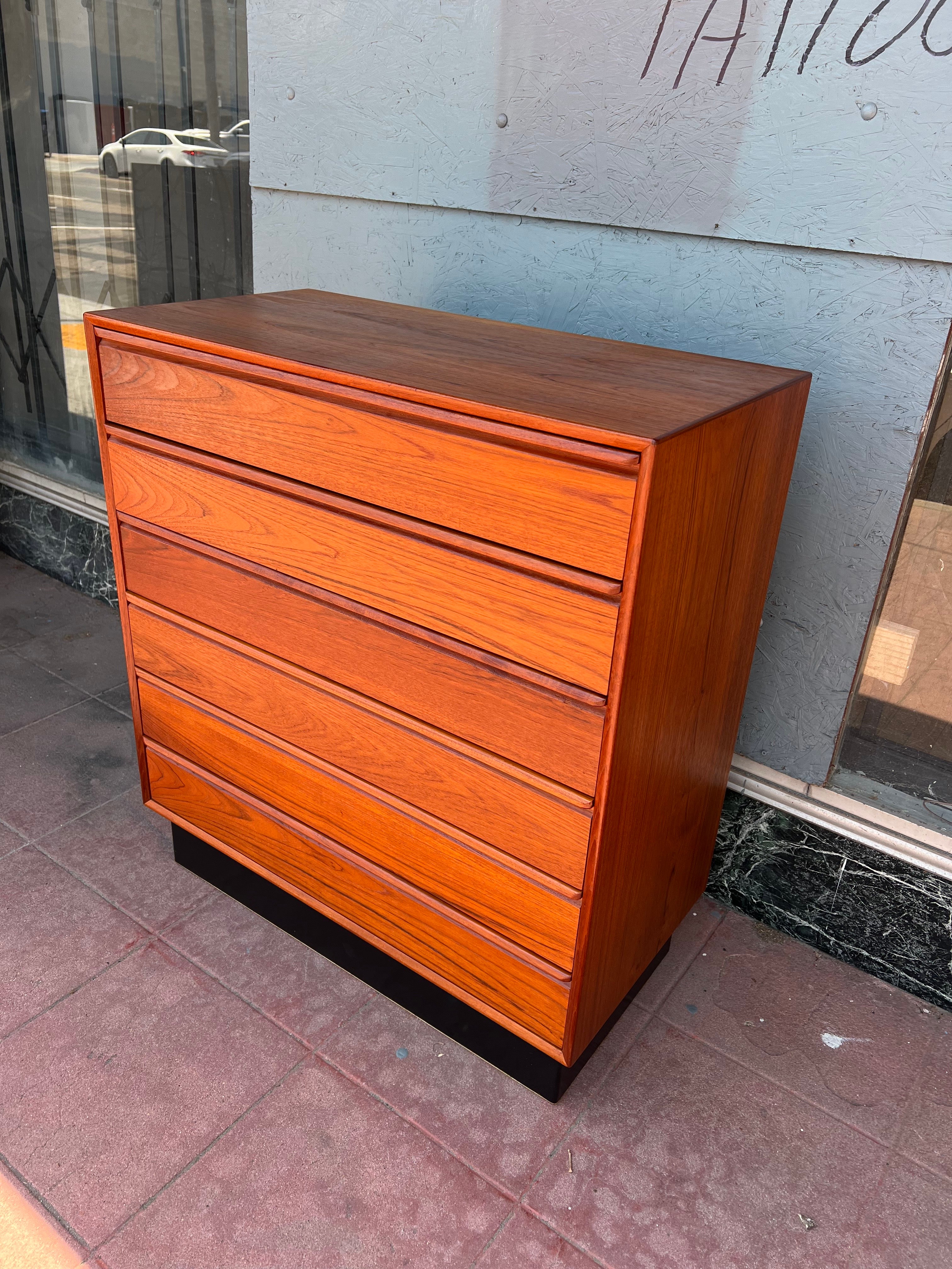 Beautiful solid Danish teak dressers tall boy with six drawers nice clean condition circa 1980's great quality and craftsmanship, stamped made in Norway dovetail drawers. by Westnofa