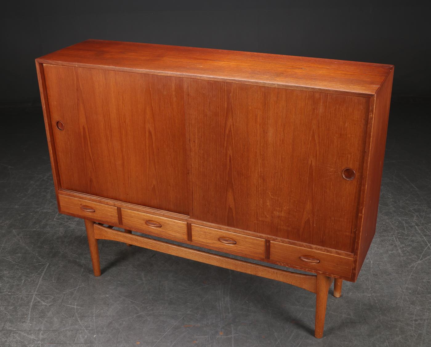 Origin: Denmark
Designer: Ejvind A. Johansson
Manufacturer: Unknown
Era: 1960s
Dimensions: 63? wide x 18? deep x 49.5? tall

Restoration includes:
• Structural + joint repair (if necessary) on all joints
• Full exterior refinish in lacquer
