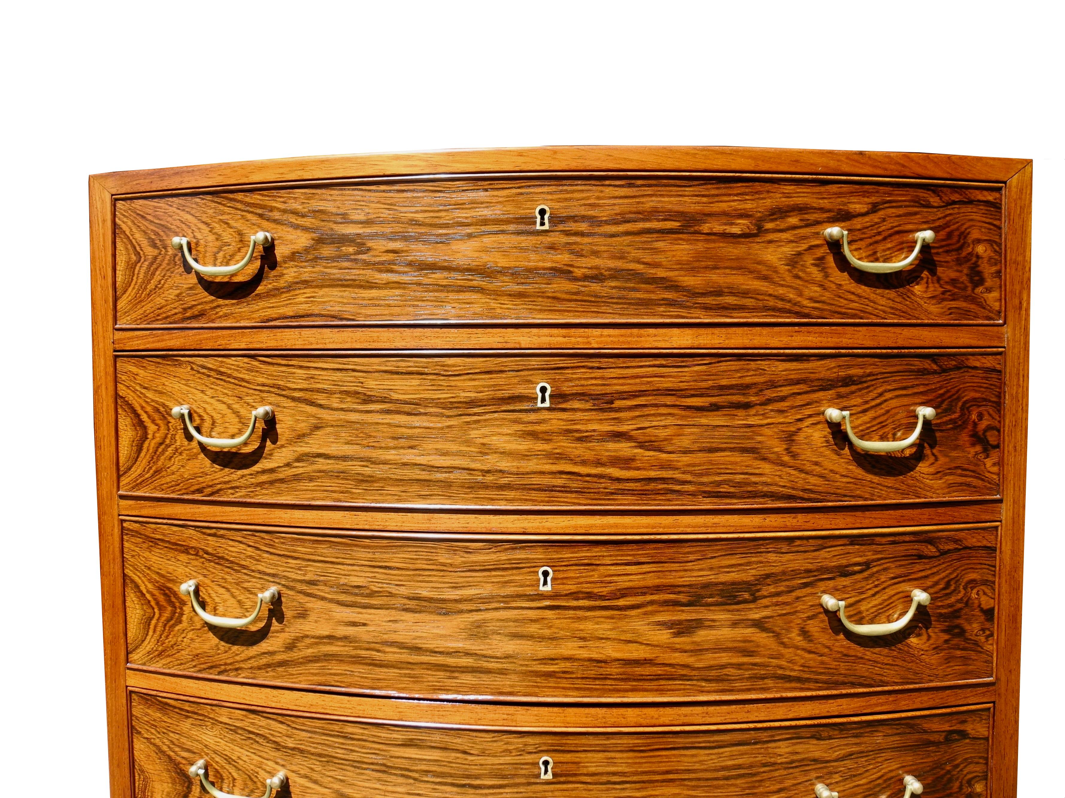 Danish Modern Tall Rosewood Bombe Dresser or Chest of Drawers by Ole Wanscher In Good Condition For Sale In Hudson, NY
