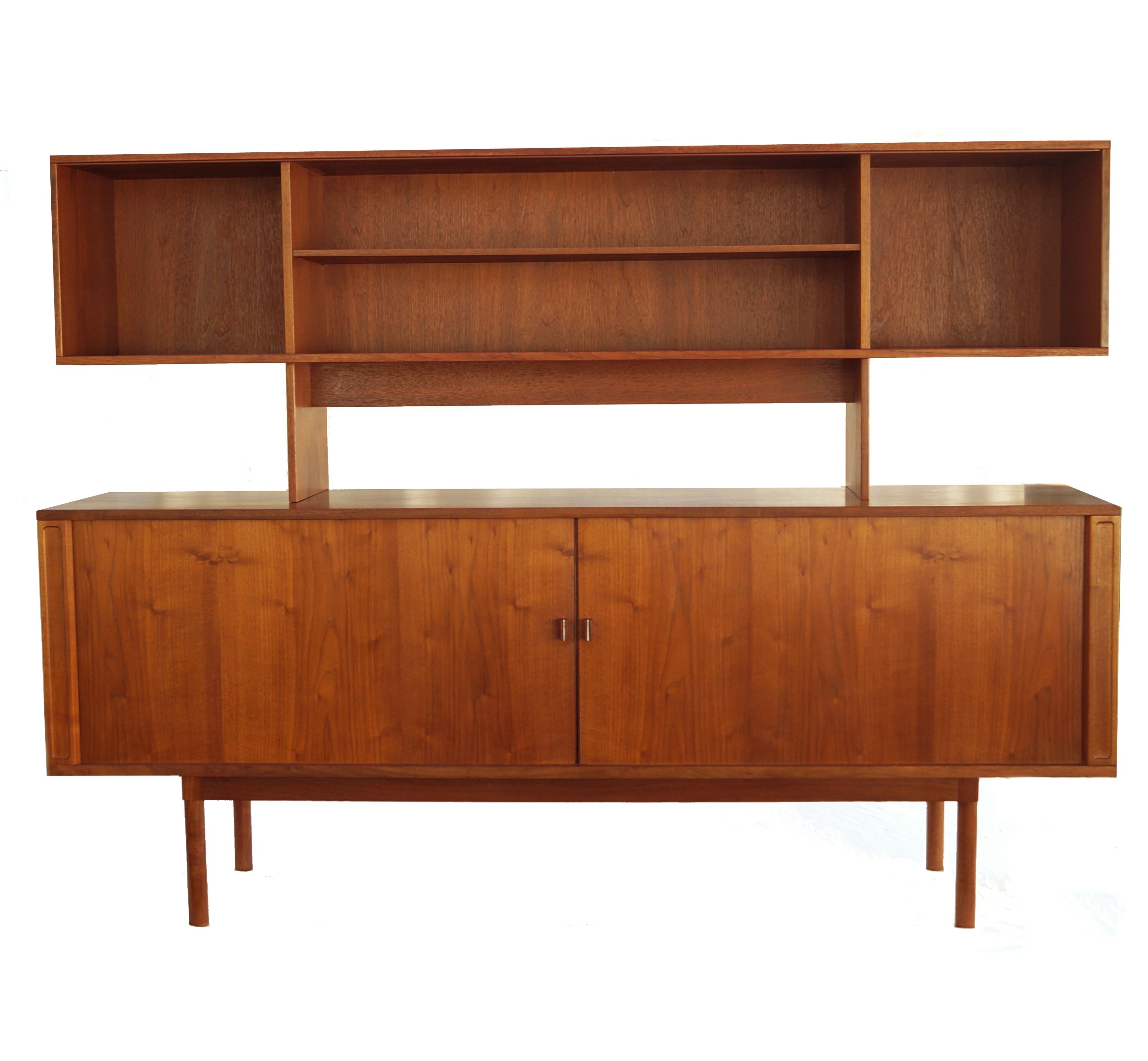 Danish modern Tambour door credenza cabinet buffet with Hutch Jens H. Quistgaard for Lovig. It features 4 adjustable drawers and a shelf on either side. The hutch has 1 shelf. The credenza alone measures 78 and 7/8