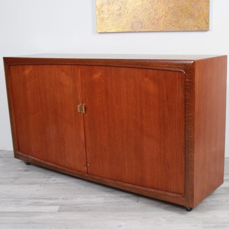 Just refinished oak sideboard from the 1960s. Large with adjustable shelves and drawers for tableware and cutlery, this is a bit of a departure from the more frequently produced teak sideboards of the era.