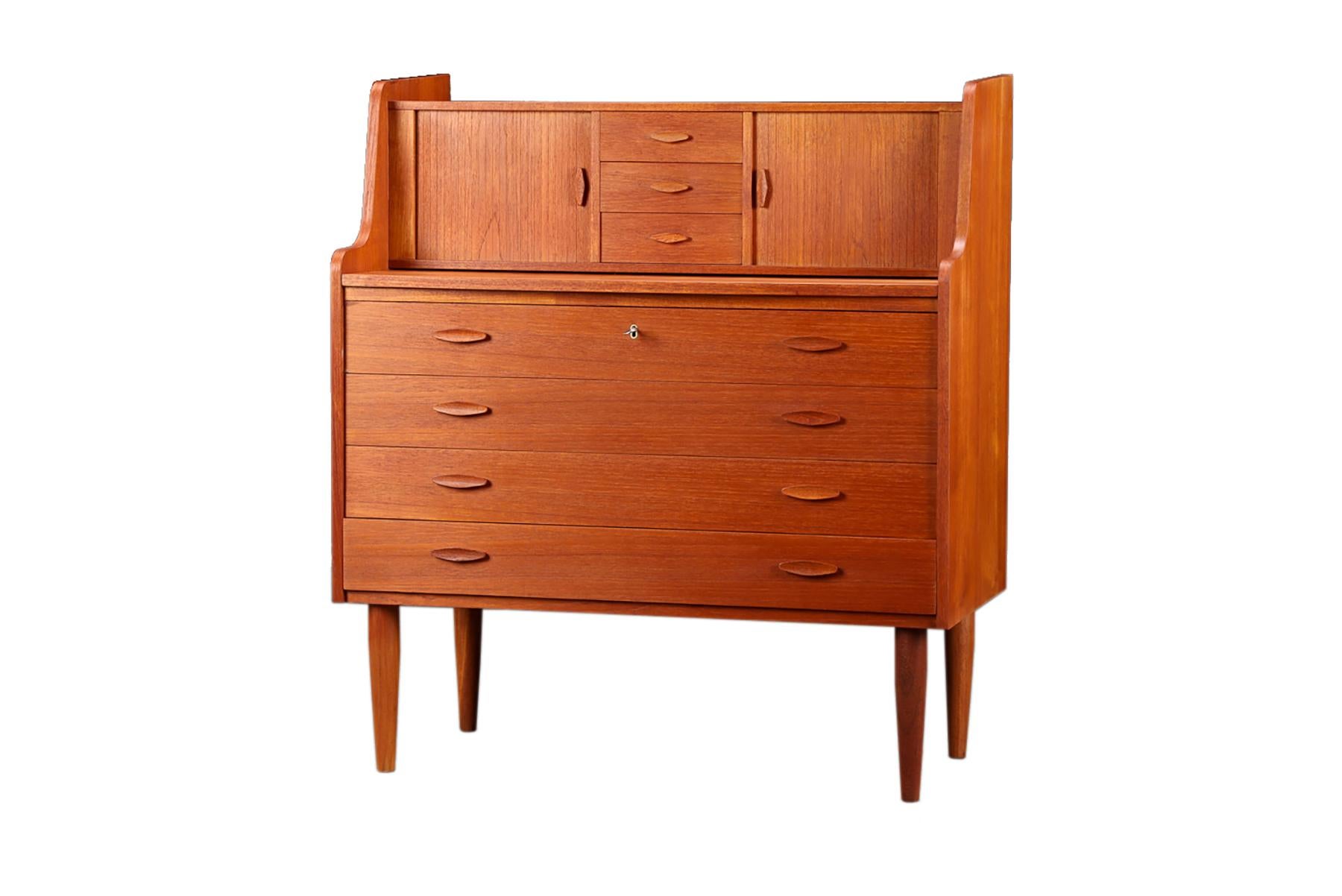 Origin: Denmark
Designer: Unknown
Manufacturer: Unknown
Era: 1960s
Materials: Teak
Measurements: 35.5? wide x 18.25? deep x 40.25? tall

Condition: In excellent original condition with some light vintage wear

Restoration includes:
•