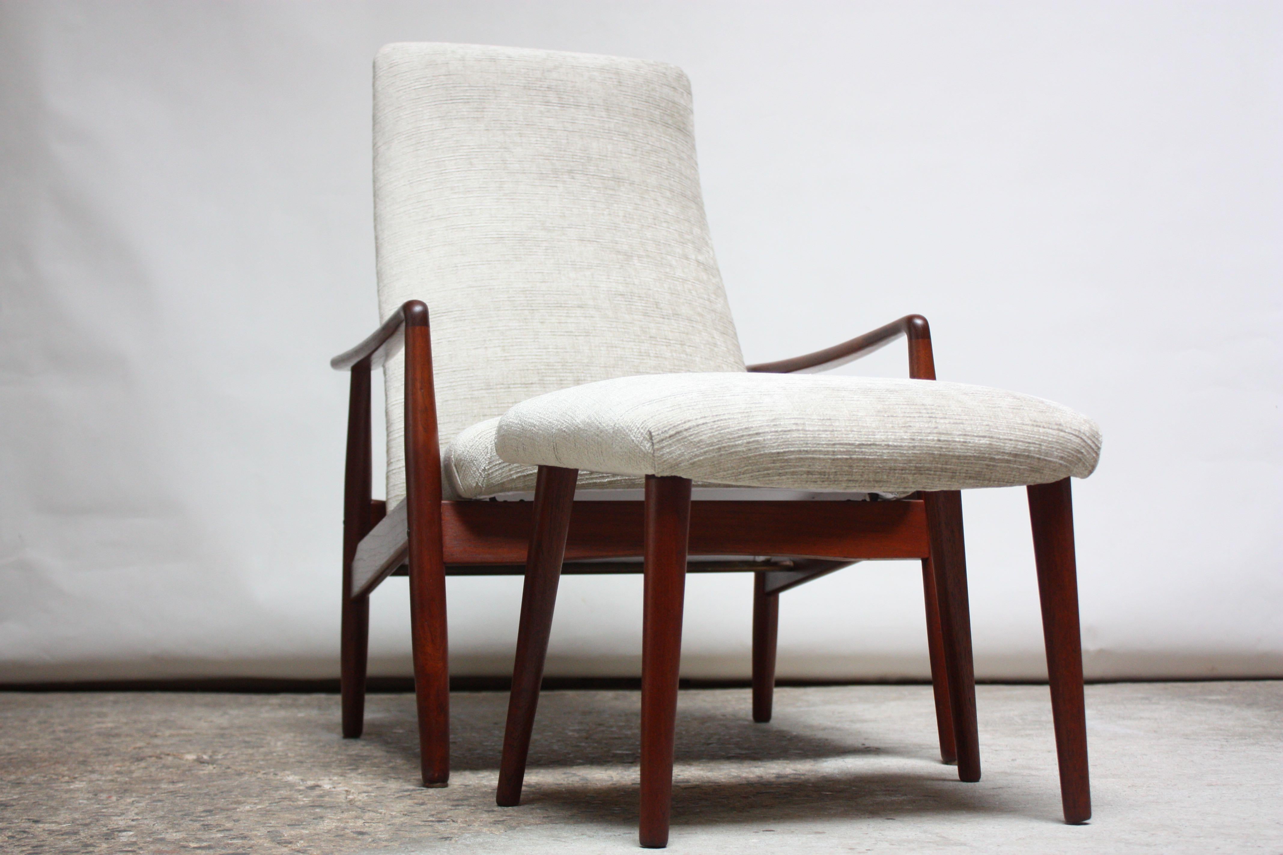 Danish high-back lounge chair and matching ottoman designed by Søren Ladefoged for SL Møbler. The chair can be manually adjusted to two positions. The seat can be shifted into the reclining position by lifting and sliding the seat back until the