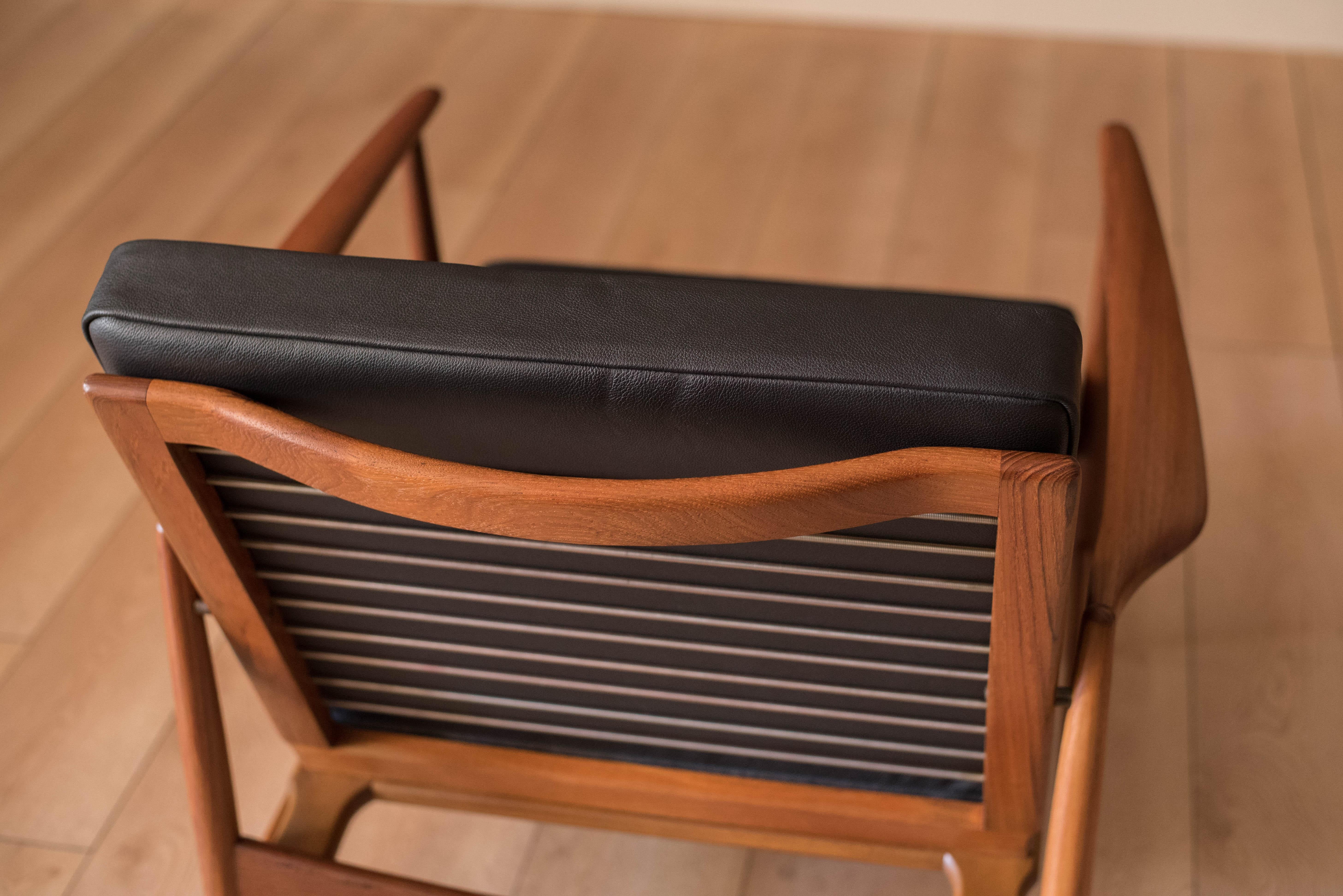 Danish Modern Teak and Black Leather Lounge Chair by Ib Kofod-Larsen for Selig 5