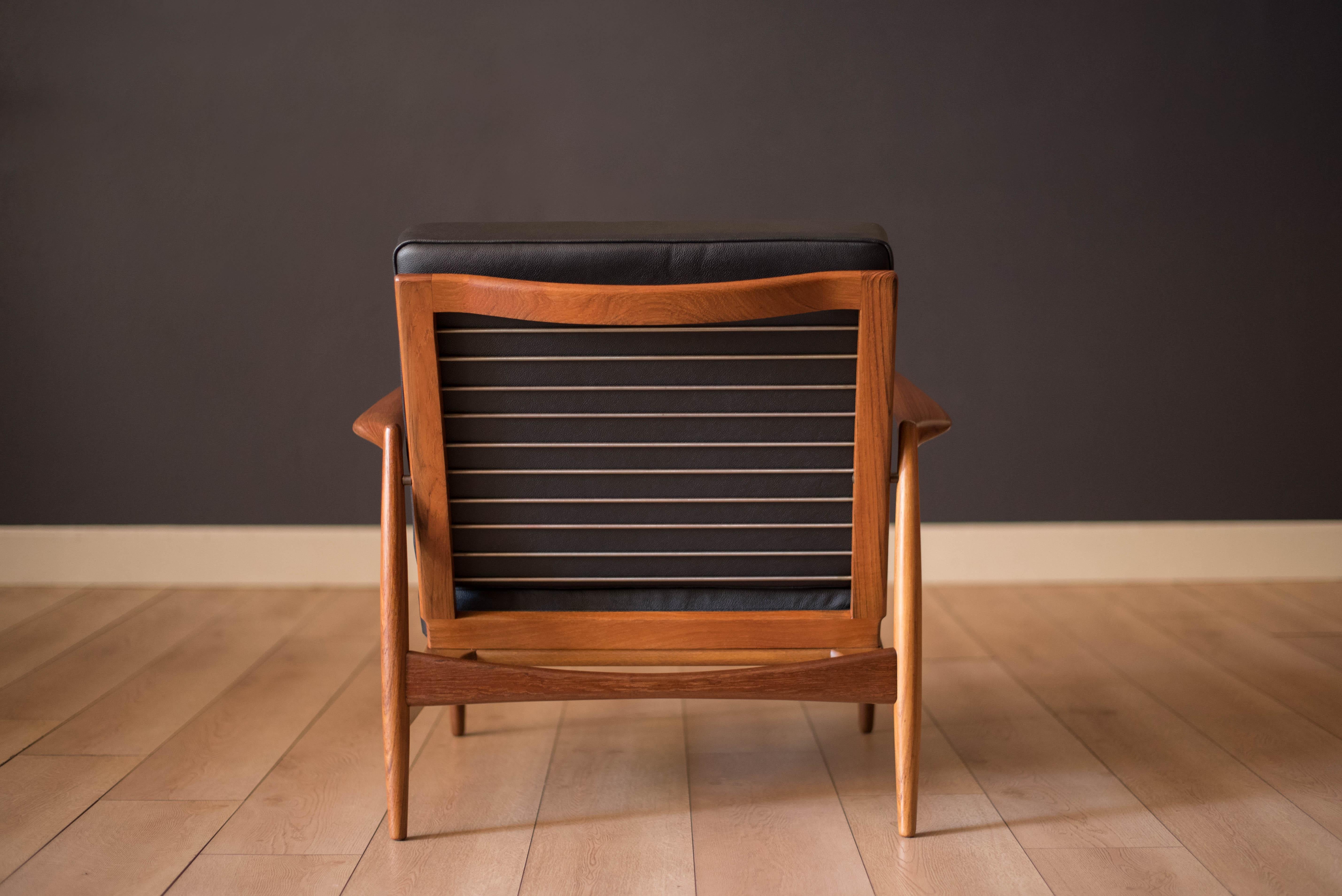 Danish Modern Teak and Black Leather Lounge Chair by Ib Kofod-Larsen for Selig 6