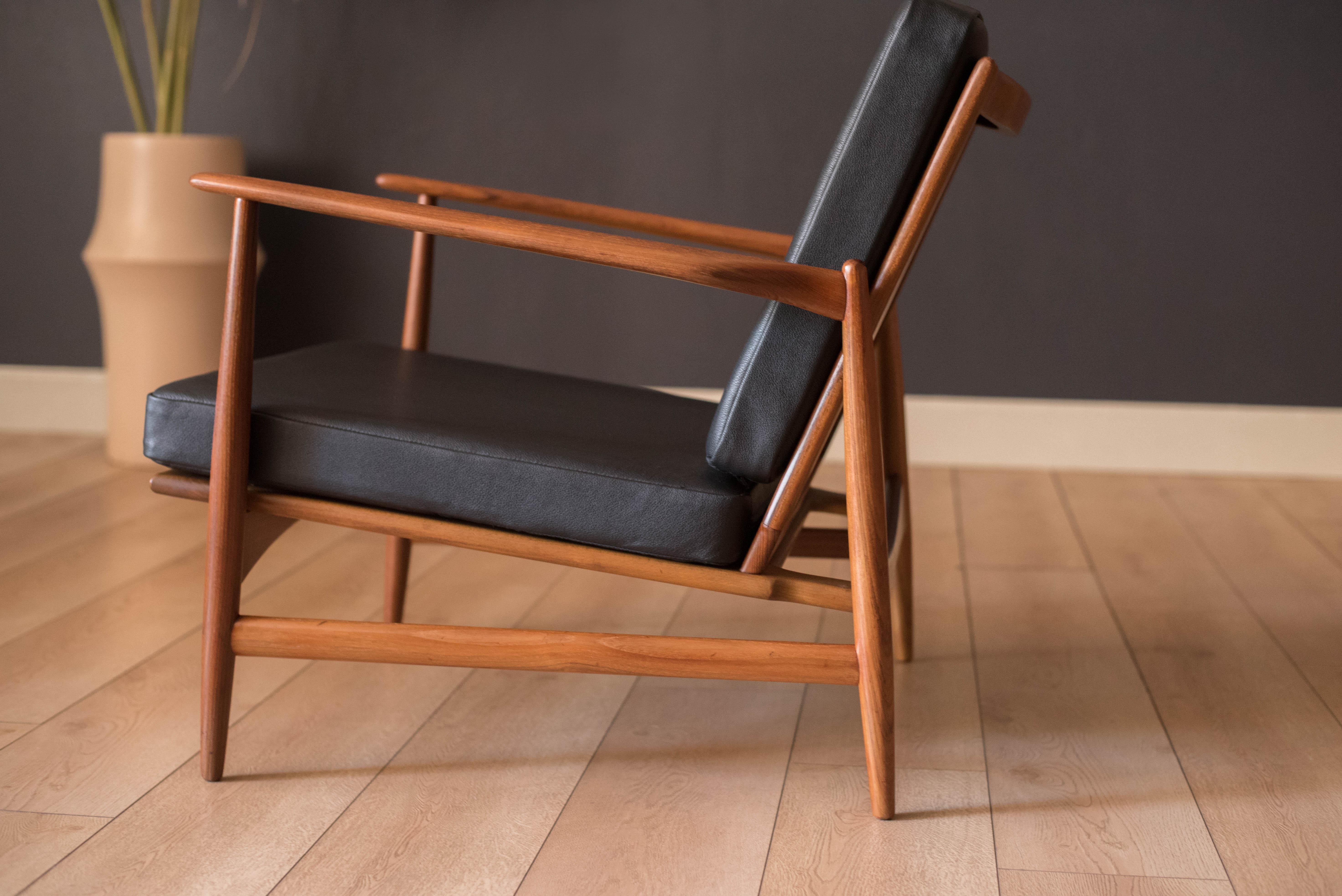 Scandinavian Modern Danish Modern Teak and Black Leather Lounge Chair by Ib Kofod-Larsen for Selig