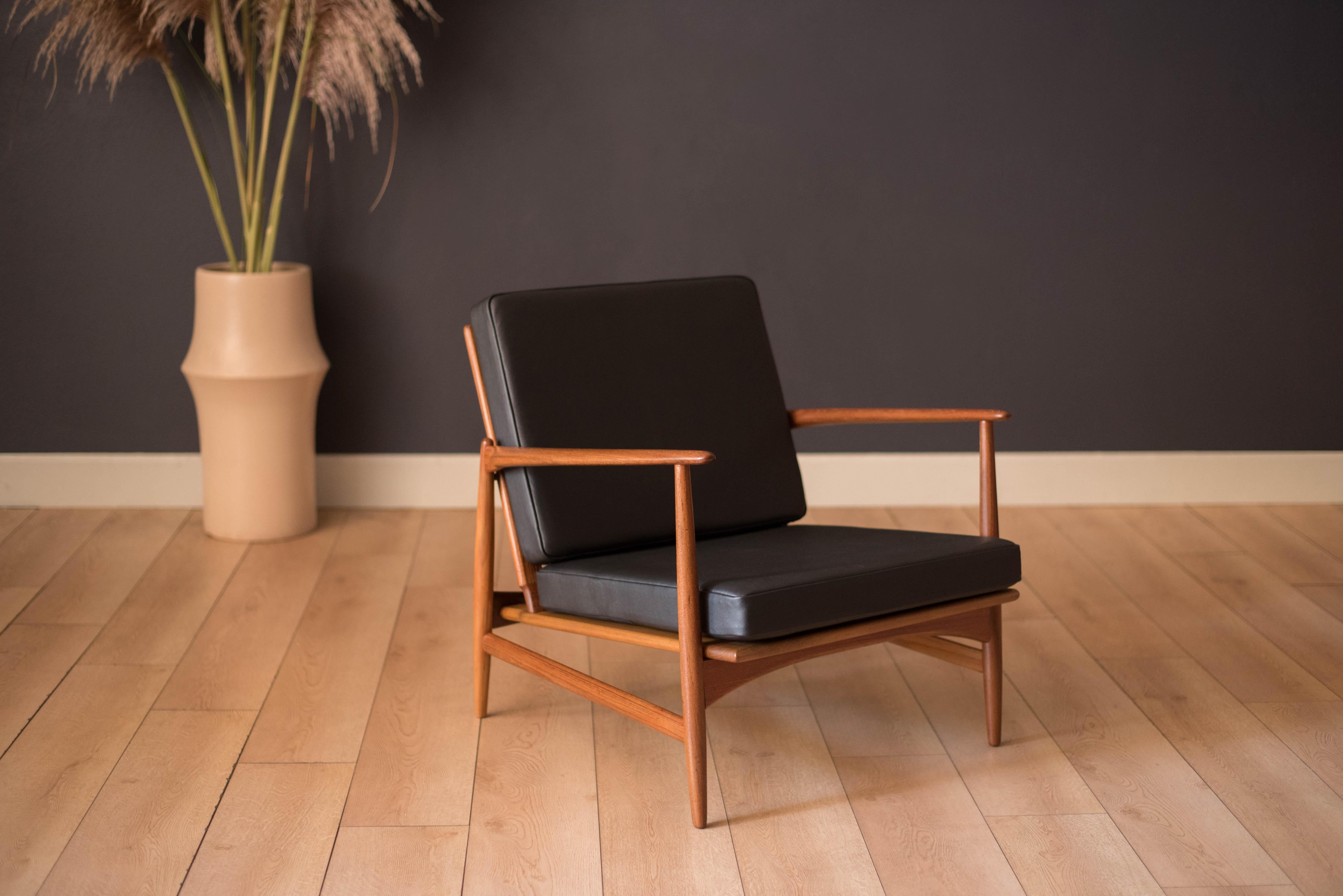Danish Modern Teak and Black Leather Lounge Chair by Ib Kofod-Larsen for Selig 1