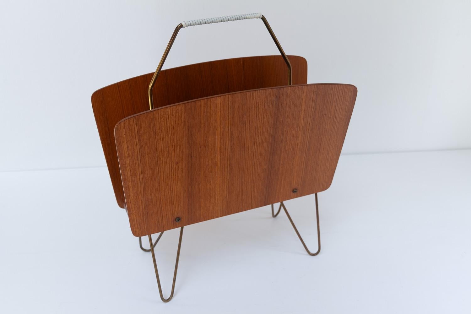 Scandinavian Modern Danish Modern Teak and Brass Magazine Rack, 1950s.