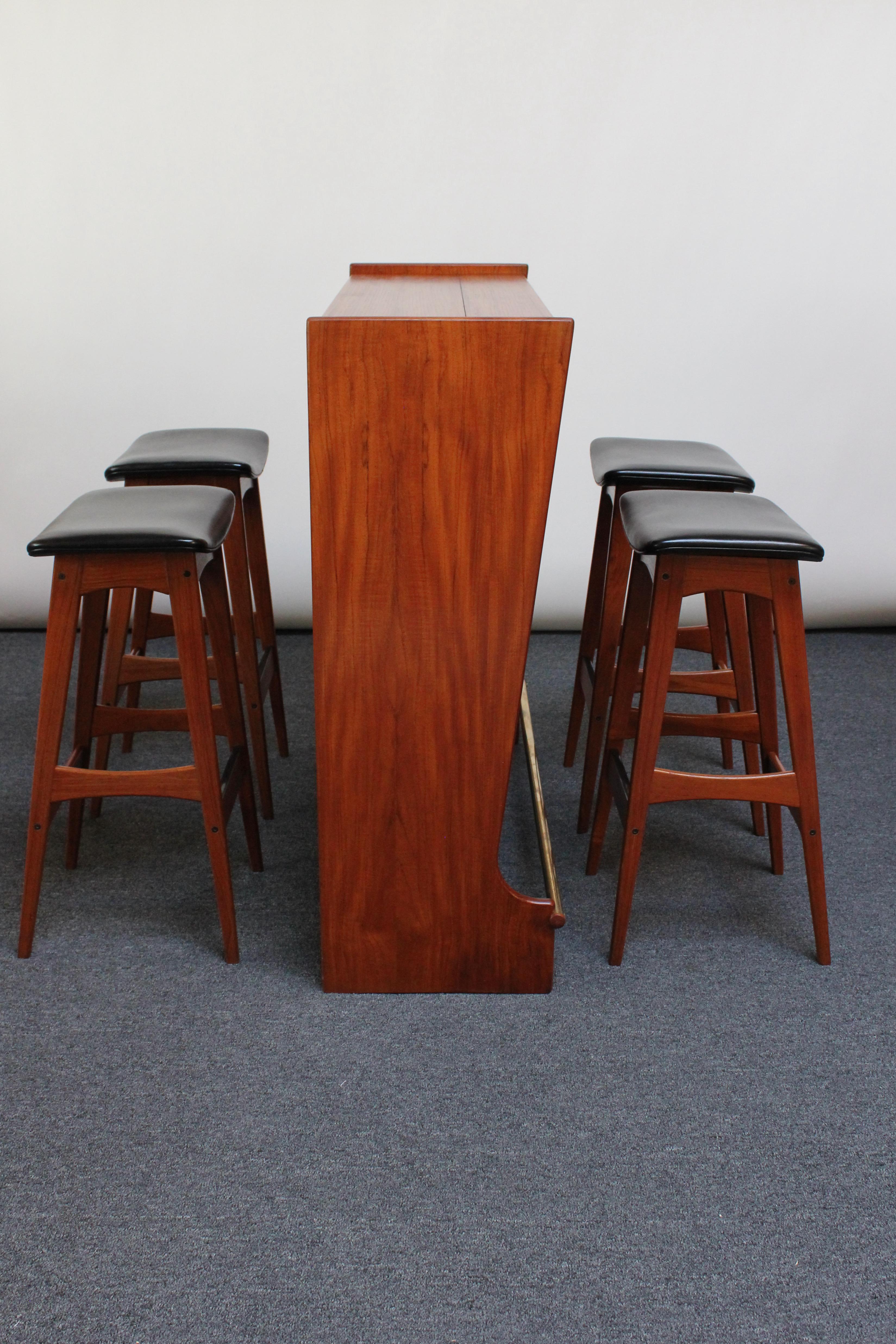 Mid-Century Modern Danish Modern Teak Bar Cabinet and Four Leather Stools by Johannes Andersen