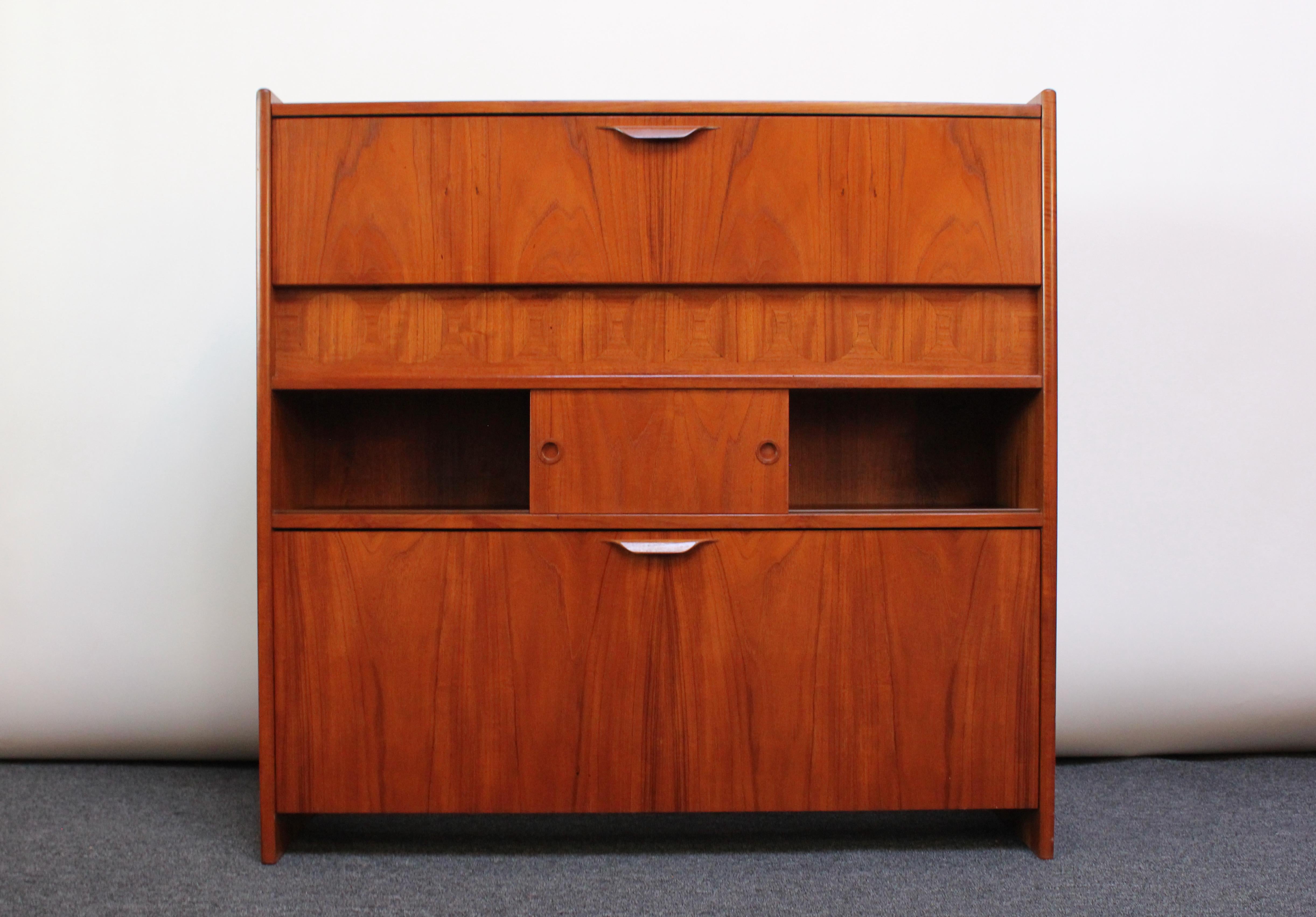 Danish Modern Teak Bar Cabinet and Four Leather Stools by Johannes Andersen 1