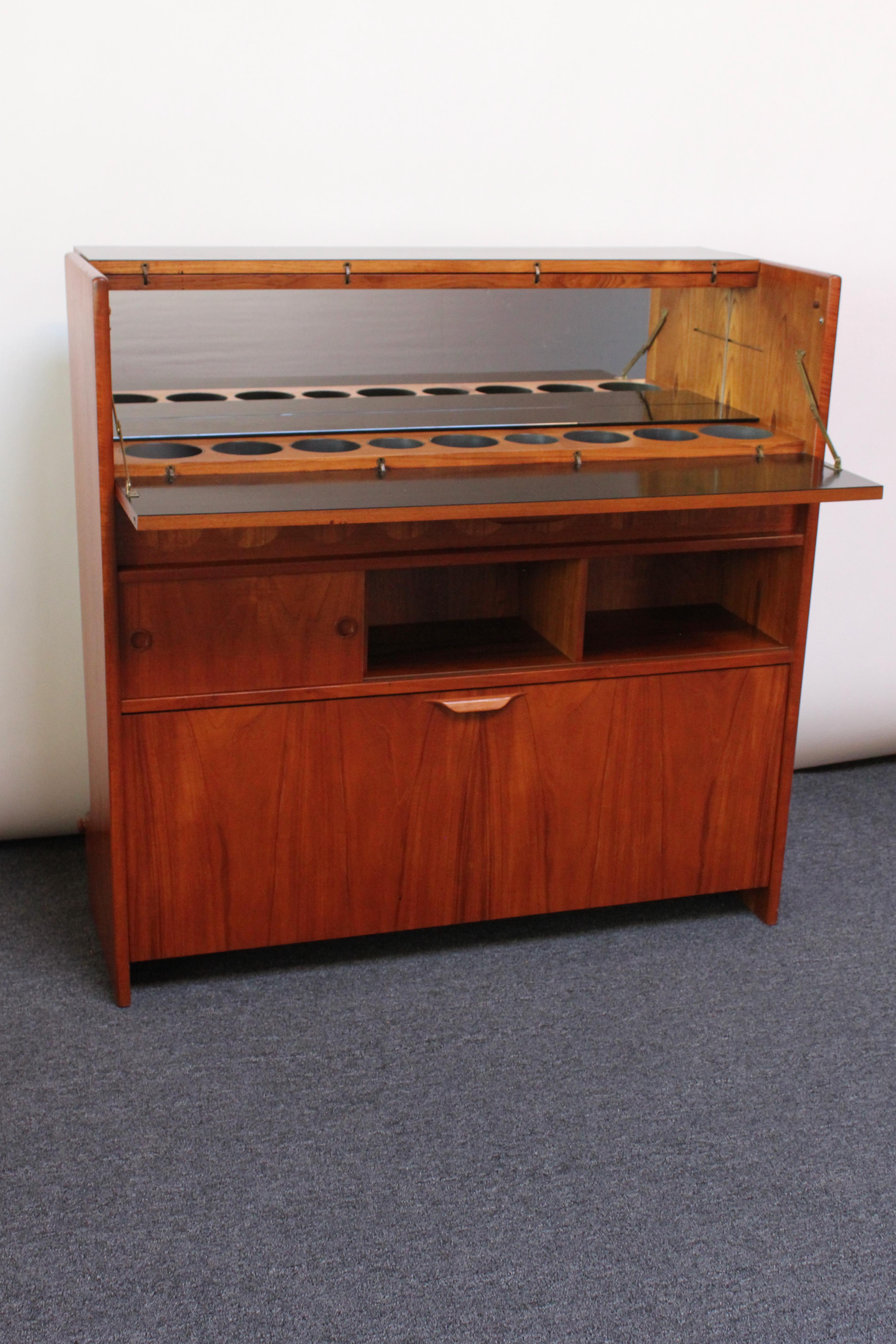 Danish Modern Teak Bar Cabinet and Four Leather Stools by Johannes Andersen 2