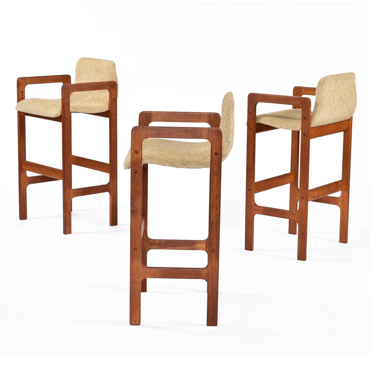 These classic and comfortable teak bars tools by D-Scan resemble Erik Buch’s popular design.   Scandinavian modern simplicity and practicality.  Solid teak architectural frames support the low-back, curved, S-shape seats.  The seats are upholstered